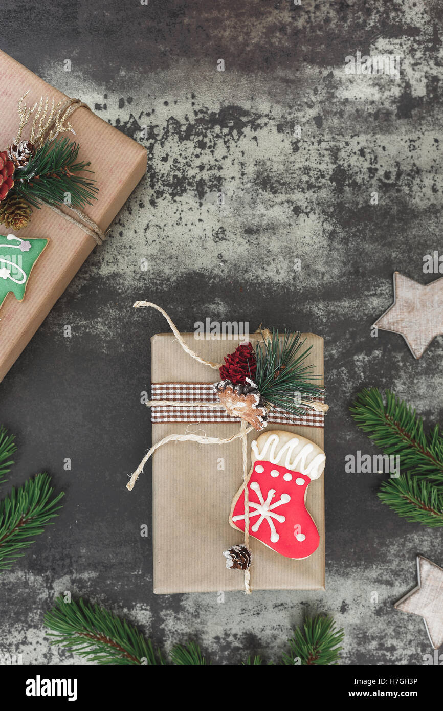 Christmas gift. Beautiful presents in brown paper tied with string and ...