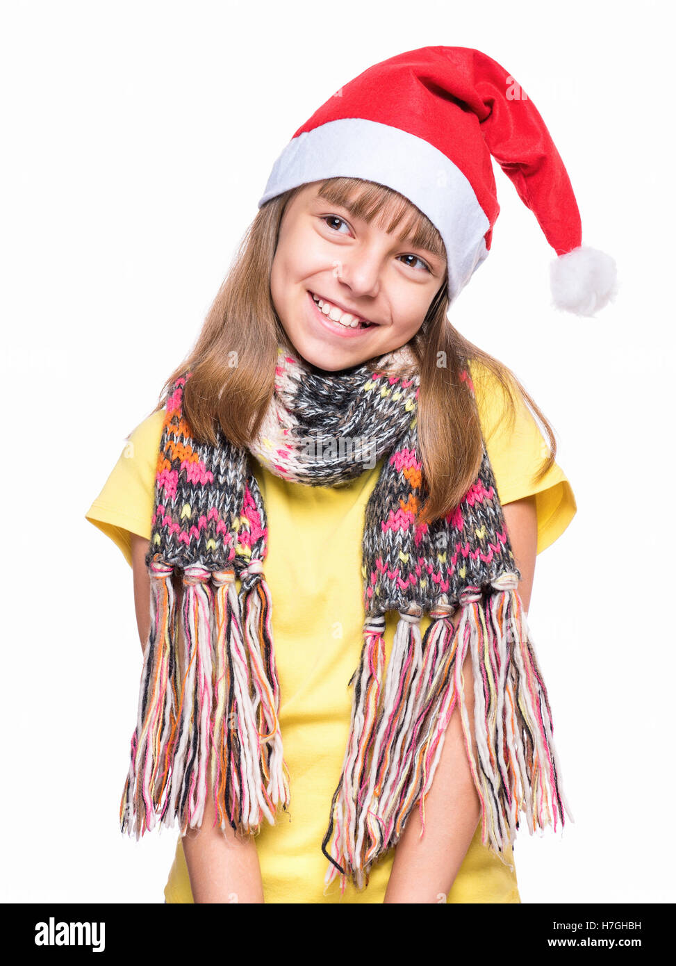 Cute girl wearing Santa Claus hat Stock Photo - Alamy