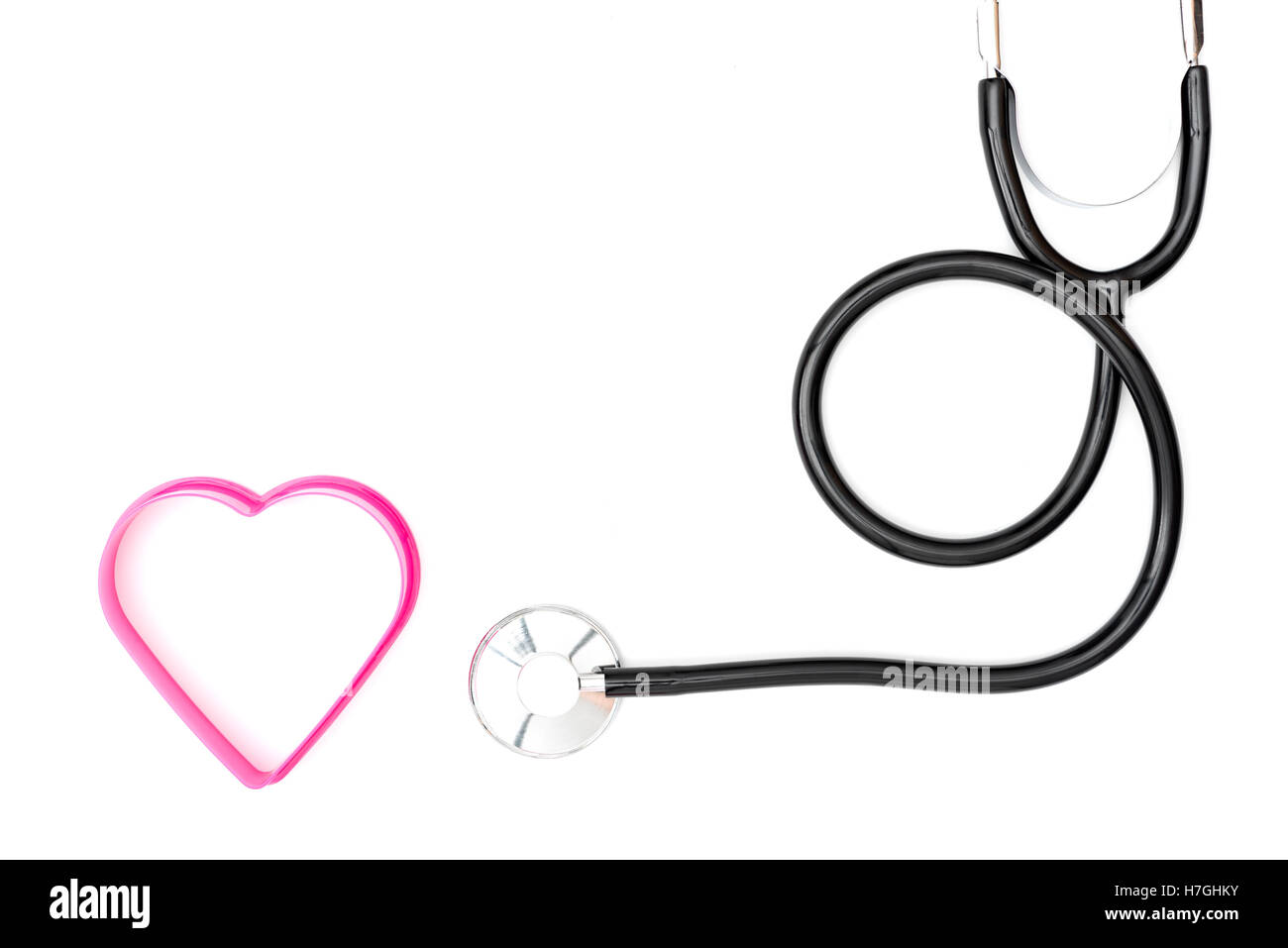 stethoscope and heart shape on white background Stock Photo - Alamy