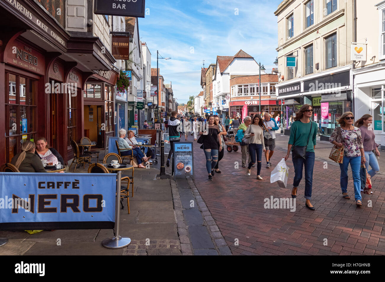 Shoppers on High Street in Canterbury Kent England United Kingdom UK Stock Photo