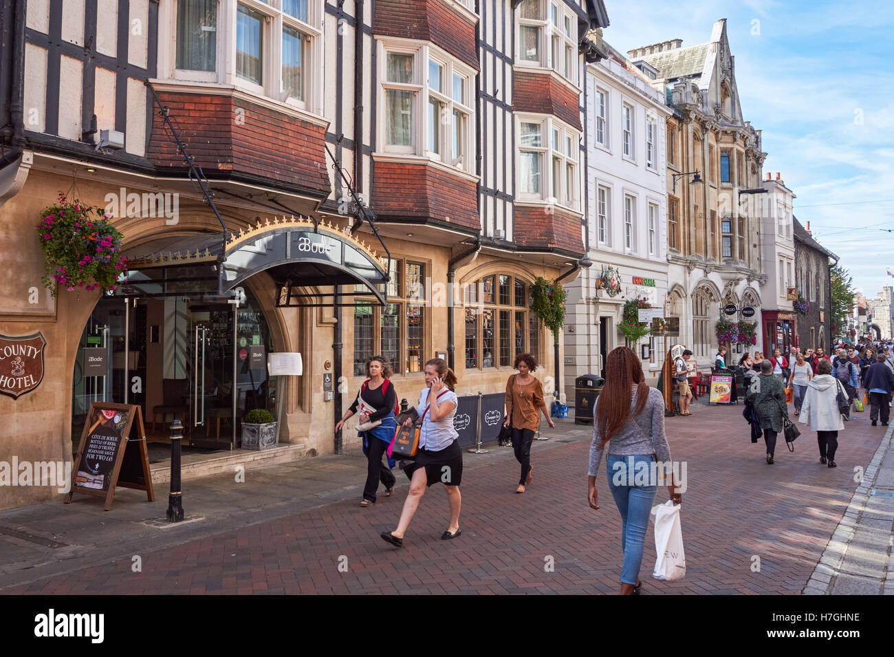 Shoppers on High Street in Canterbury Kent England United Kingdom UK Stock Photo