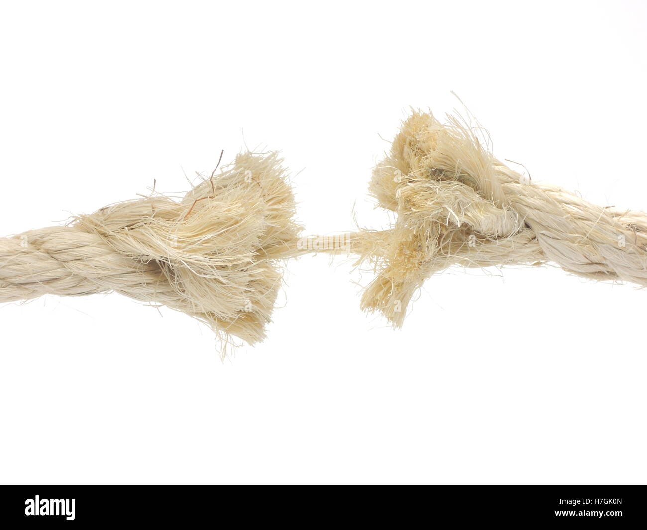 Risk of breaking - illustrated by frayed rope Stock Photo - Alamy