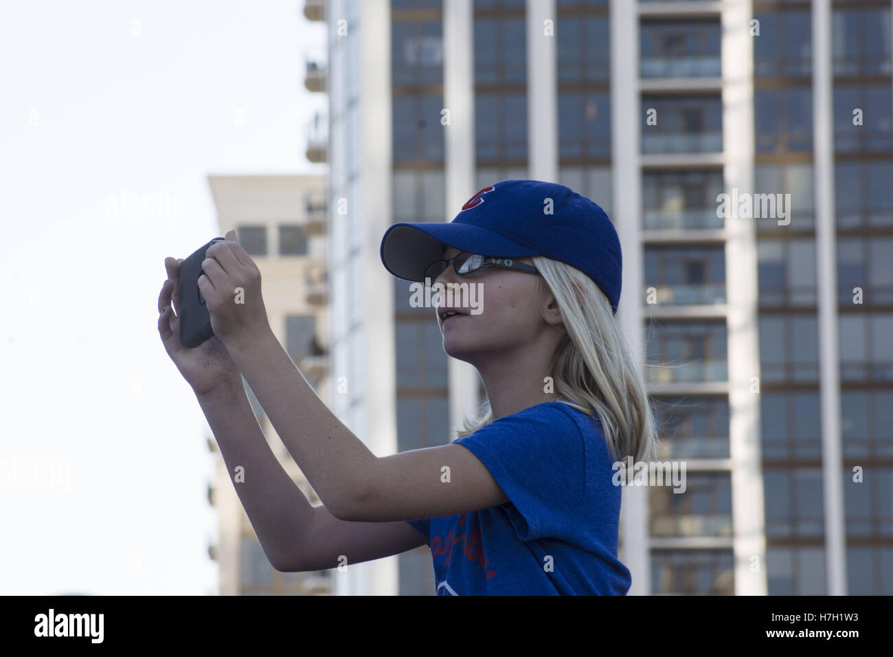 Chicago, Illinois, USA. 4th Nov, 2016. 5 Million ecstatic Chicagoans lined the parade route and filled Grant Park for the World Series Champions - the Chicago Cubs celebration on November 4, 2016. The parade started at Wrigley Field, home stadium of the Cubs followed Addison Street to Lake Shore Drive to North Michigan Avenue. It then proceded South on Columbus Drive to Balbo and on to Grant Park where a huge crowd in Cubs attire waited for them. Owner of the Cubs, Tom Ricketts addressed the gathering, along with Coach Joe Madden, and some of the Cubs players including MVP Ben Zobrist Stock Photo