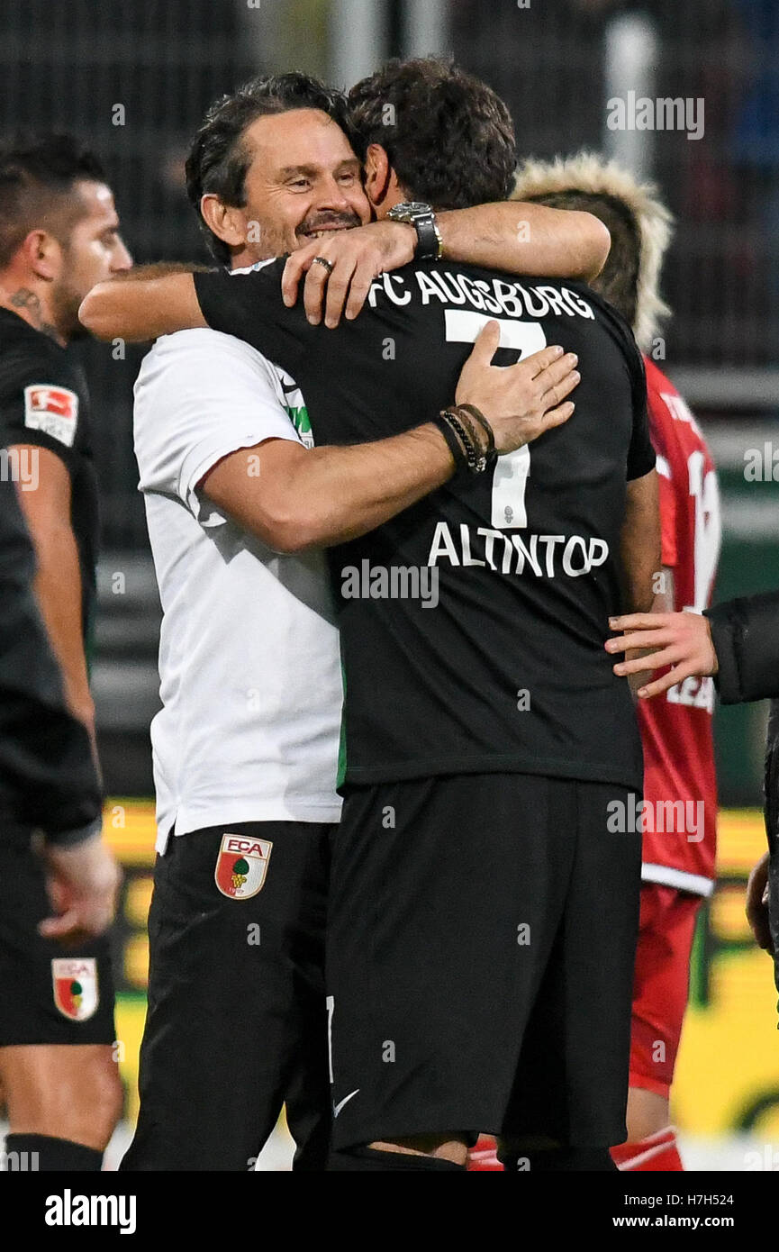 Ingolstadt, Germany. 5th Nov, 2016. Coach Dirk Schuster (l) from Augsburg embraces Halil Altintop after the 2:0 victory of the soccer match between FC Ingolstadt o4 and FC Augsburg on the tenth match day of the Bundesliga at Audi Sportpark in Ingolstadt, Germany, 5 November 2016. PHOTO: ARMIN WEIGEL/dpa (ATTENTION: Due to the accreditation guidelines, the DFL only permits the publication and utilisation of up to 15 pictures per match on the internet and in online media during the match.) Credit:  dpa/Alamy Live News Stock Photo