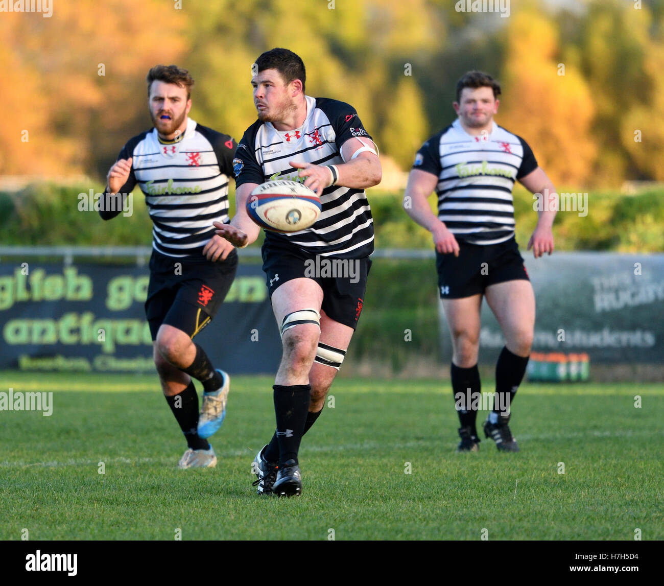 Manchester  UK 5th November 2016  Action from the South Lancashire/Cheshire Division 1 match between Broughton Park, in black, and Oswestrys, in red. Broughton Park win 62-0, after leading 22-0 at half-time to move into second place and keep Oswestry in bottom place. Stock Photo