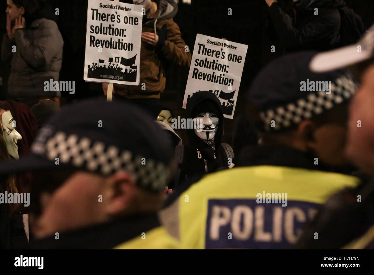 London, UK. 5th Nov, 2016. Masked protesters hold banners during the Million Mask March Credit:  Thabo Jaiyesimi/Alamy Live News Stock Photo