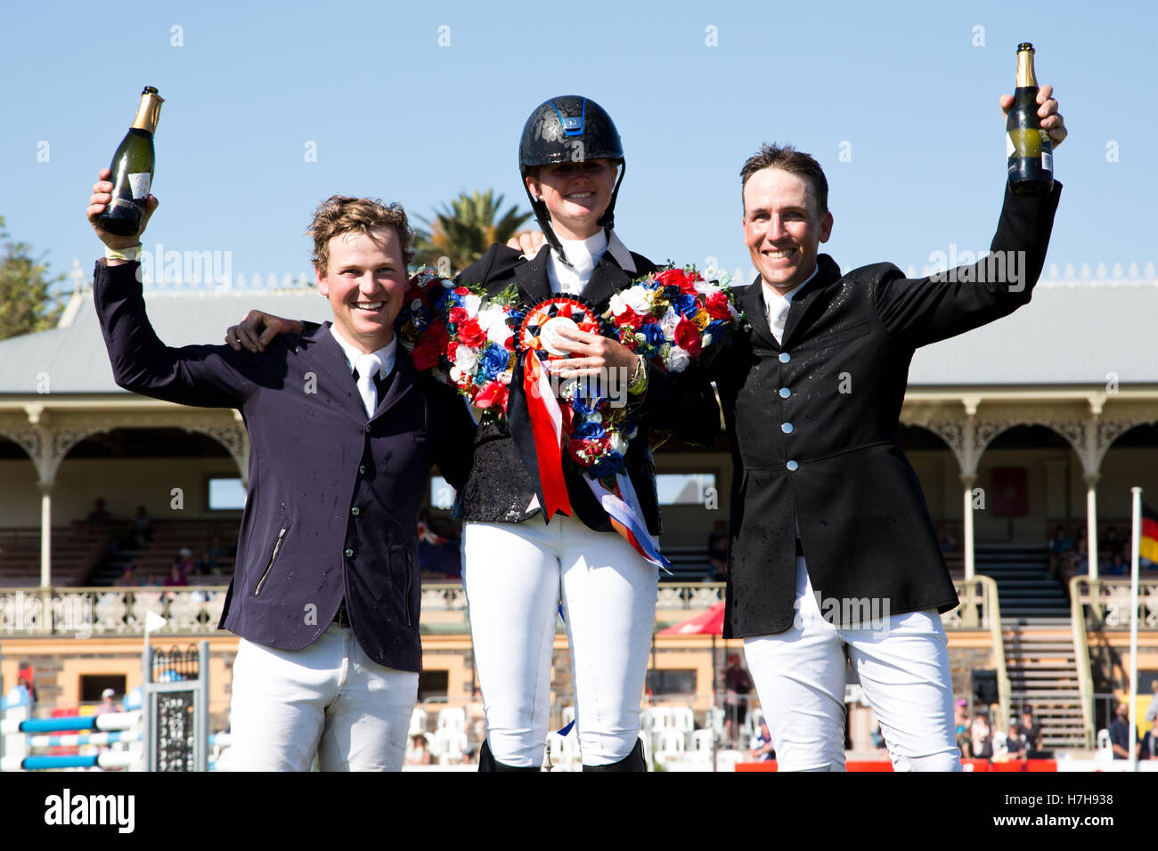 Australian International Three Day Event winner Hazel Shannon (AUS) is flanked by second place getter Wilhelm Enzinger (left) and third place getter Andrew Cooper (right). Stock Photo