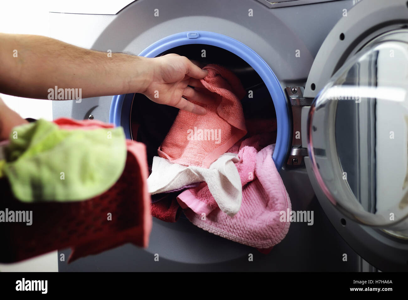 machine Washer hand put Stock Photo Alamy