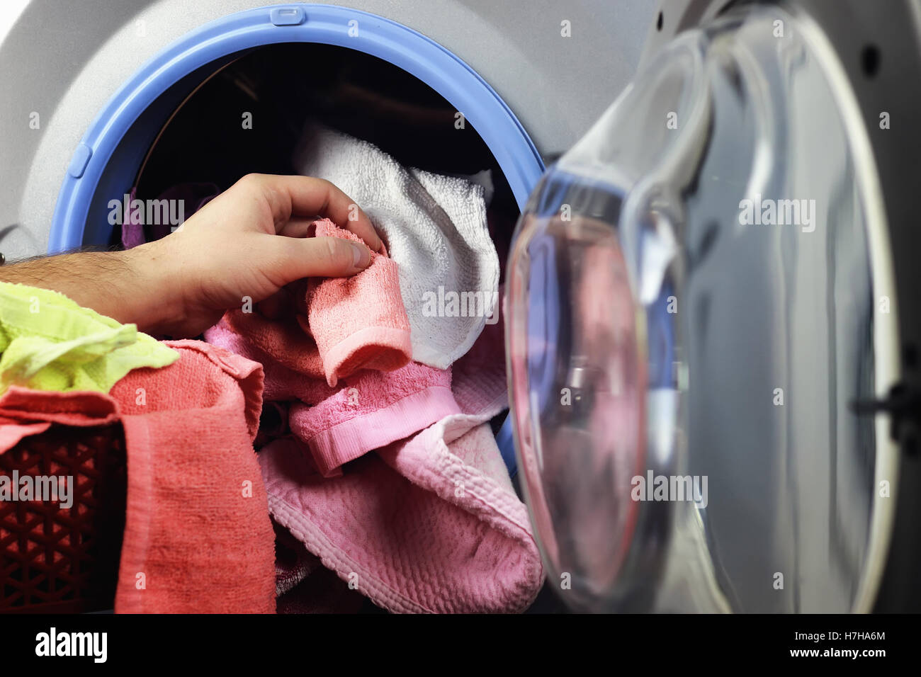 machine Washer hand put Stock Photo Alamy
