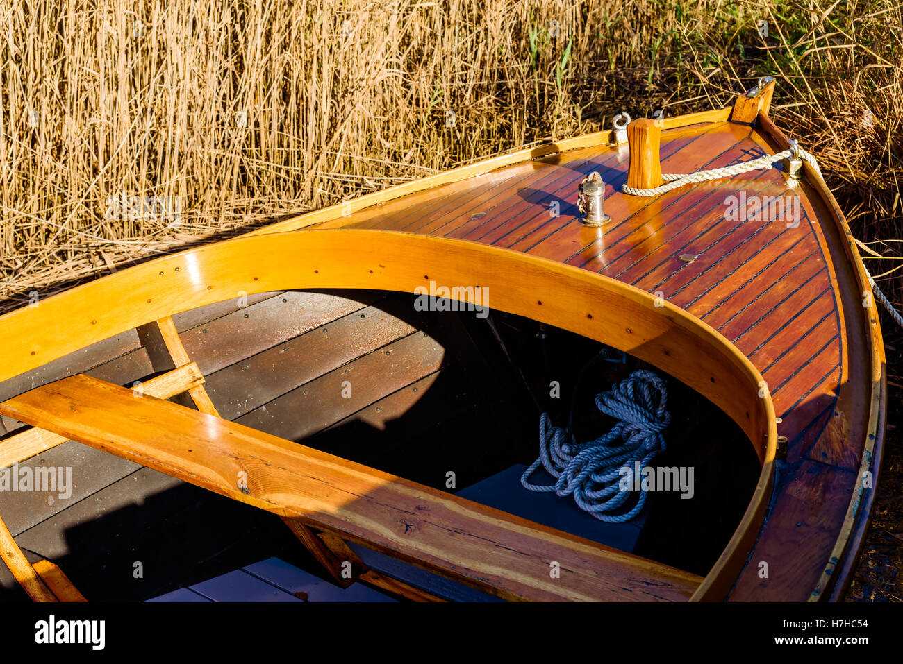 Detail of the fore of a wooden handmade motorboat. Stock Photo