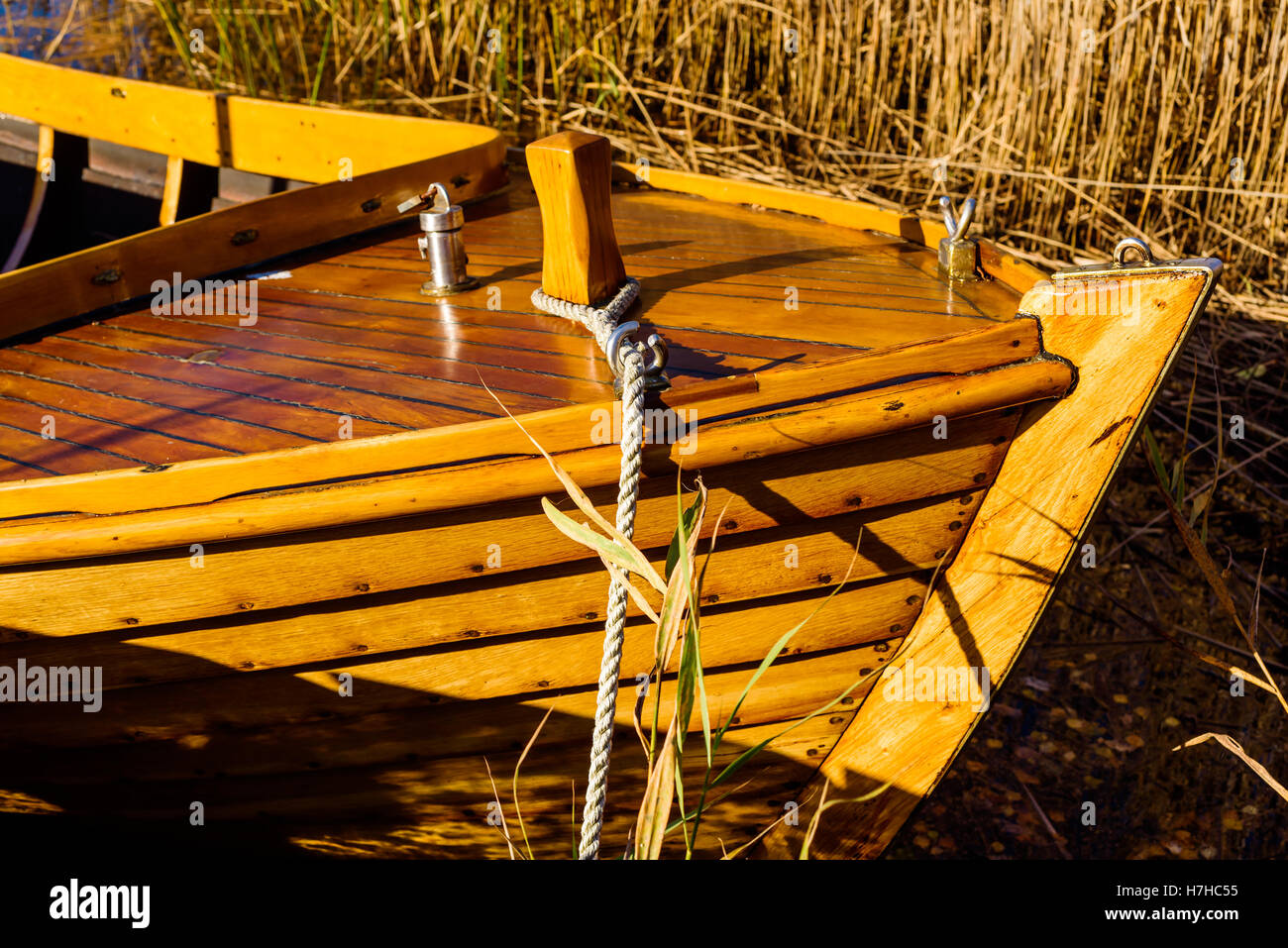 Detail of the fore of a wooden handmade motorboat. Stock Photo
