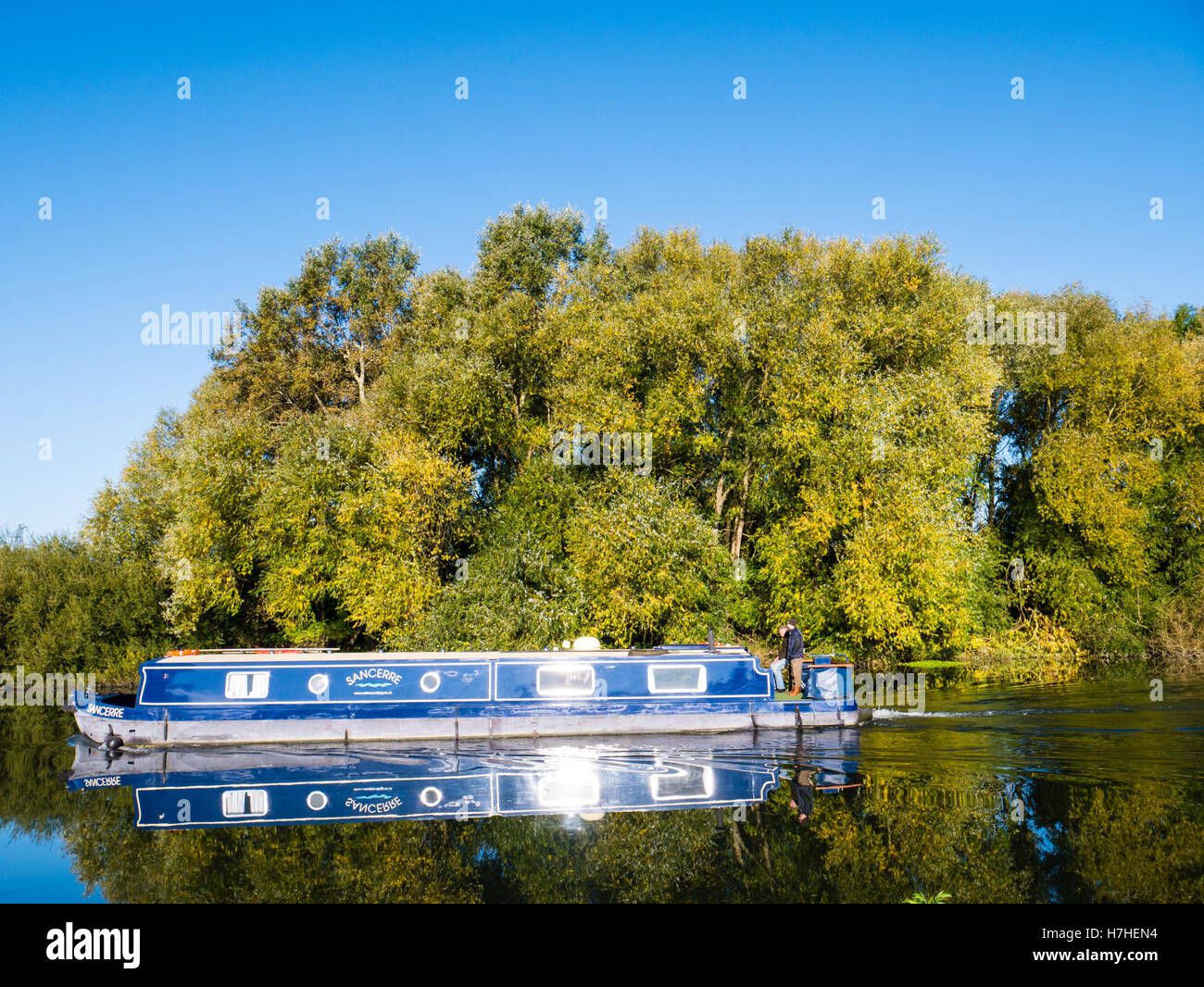 Blue Narrow Boat on River Thames, nr Reading, Berkshire, England, UK,GB. Stock Photo