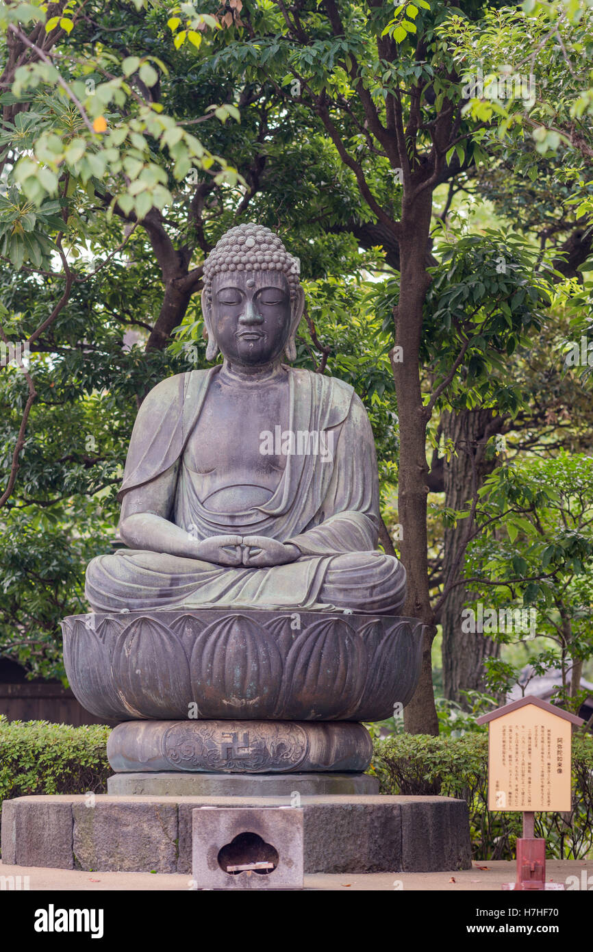 Meditating Buddha statue at Senso-ji Buddhist Temple. Stock Photo