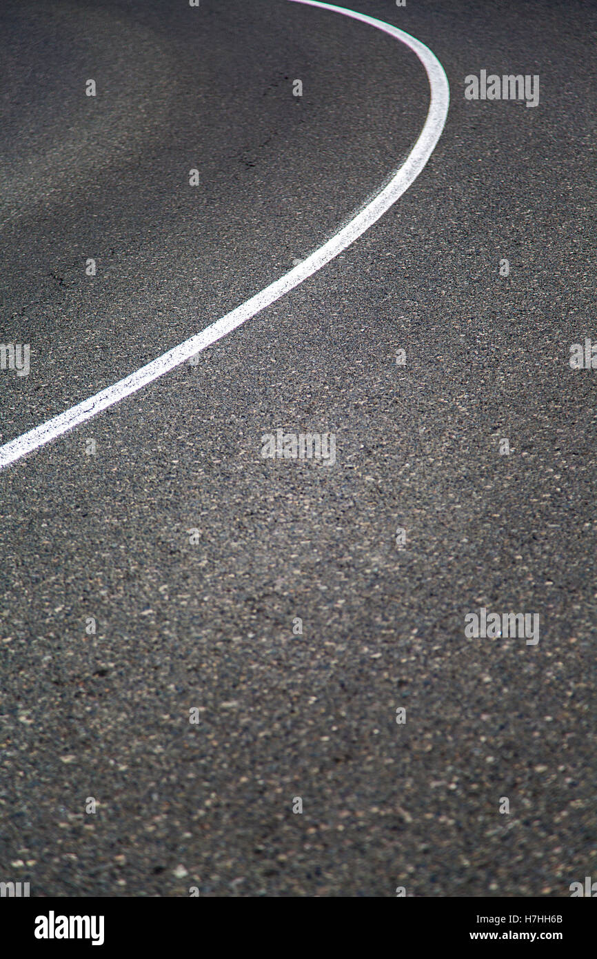 Close view of the road lane with a white line Stock Photo