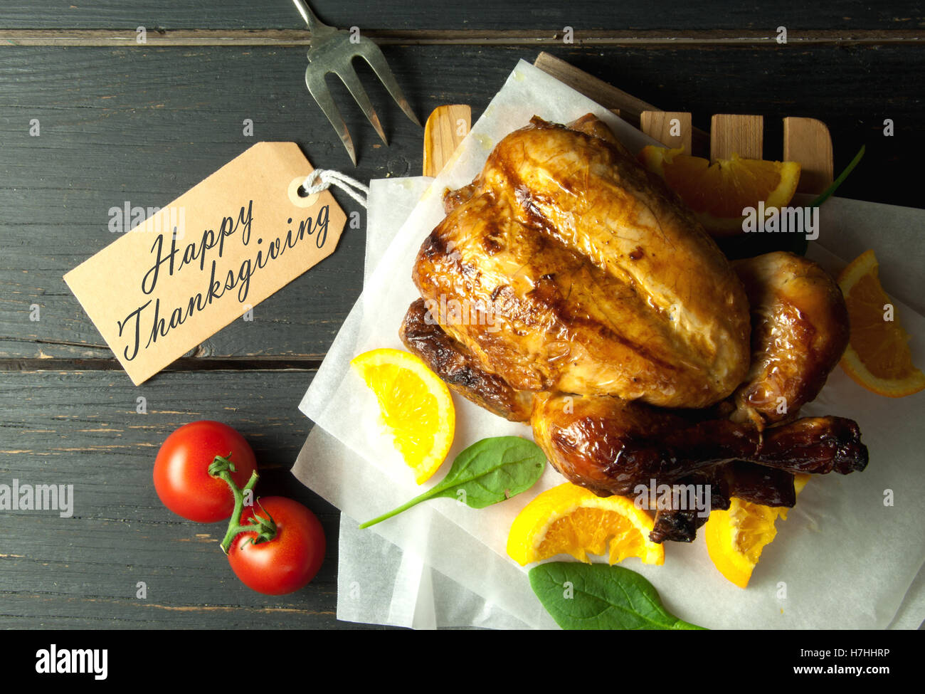 Thanksgiving label attached to roasted turkey Stock Photo