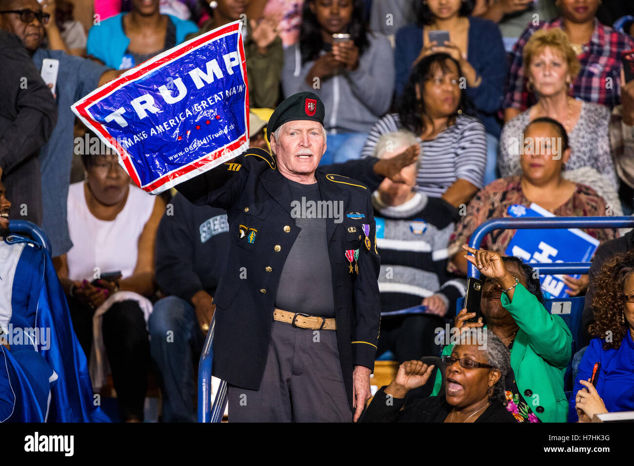 A Donald Trump Supporter Interrupts President Barack Obama at a rally for Clinton. President Barack Obama Campaigns for Hillary Clinton at Felton J. Capel Arena at Fayetteville State Univ in Fayetteville, NC Stock Photo