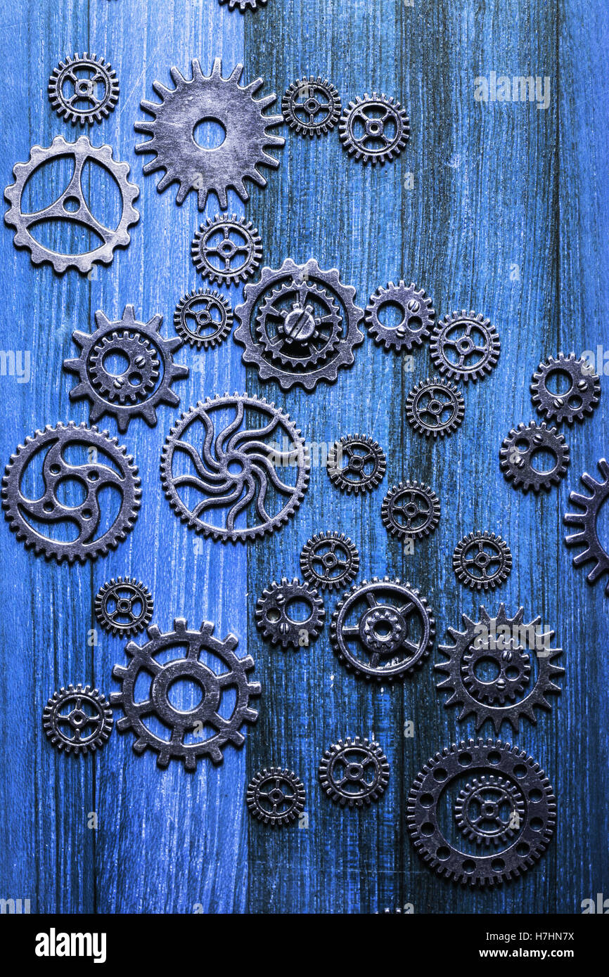 steampunk mechanical cogs gears wheels on blue background Stock Photo ...