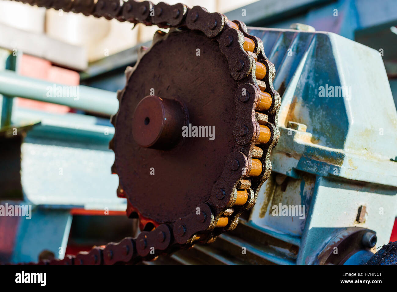 Industrial cogwheel and chain with grease and dirt Stock Photo