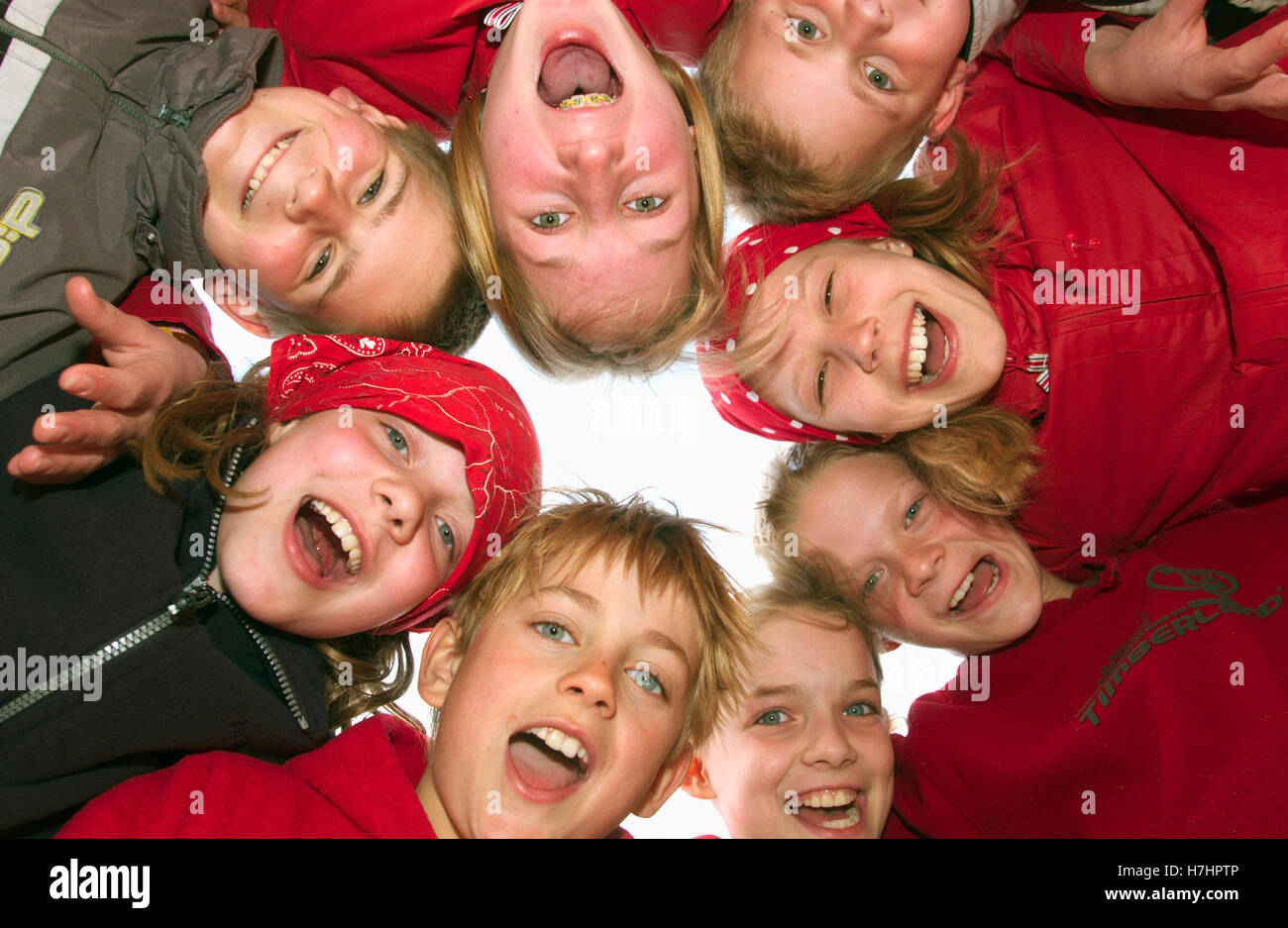 Boys and girls, 12-13 years, circle of friends Stock Photo