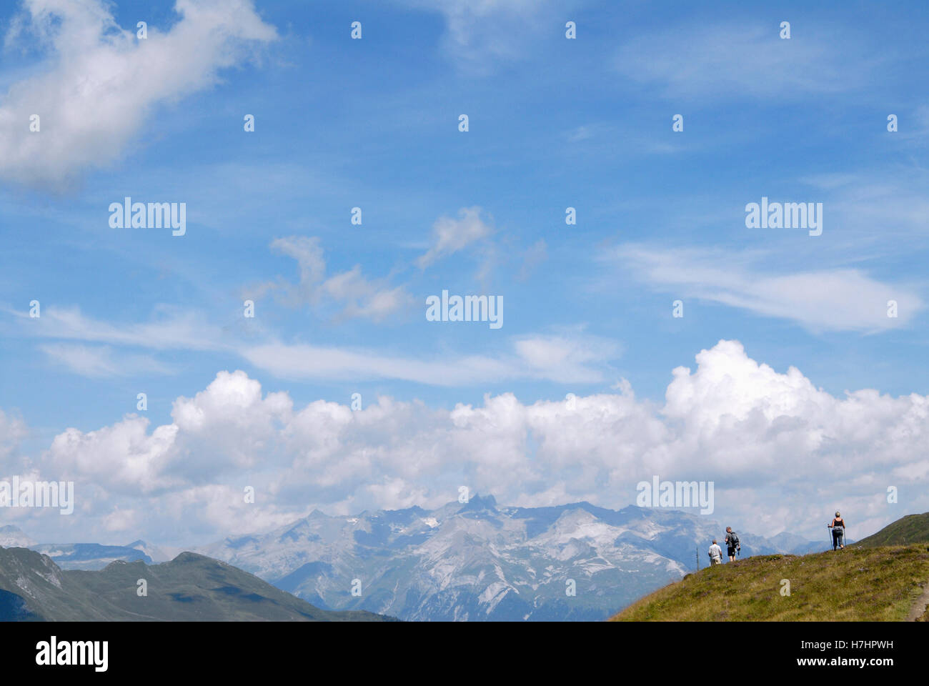 Hikers on Glaser Grat ridge in the canton of Grisons, Switzerland, Europe Stock Photo