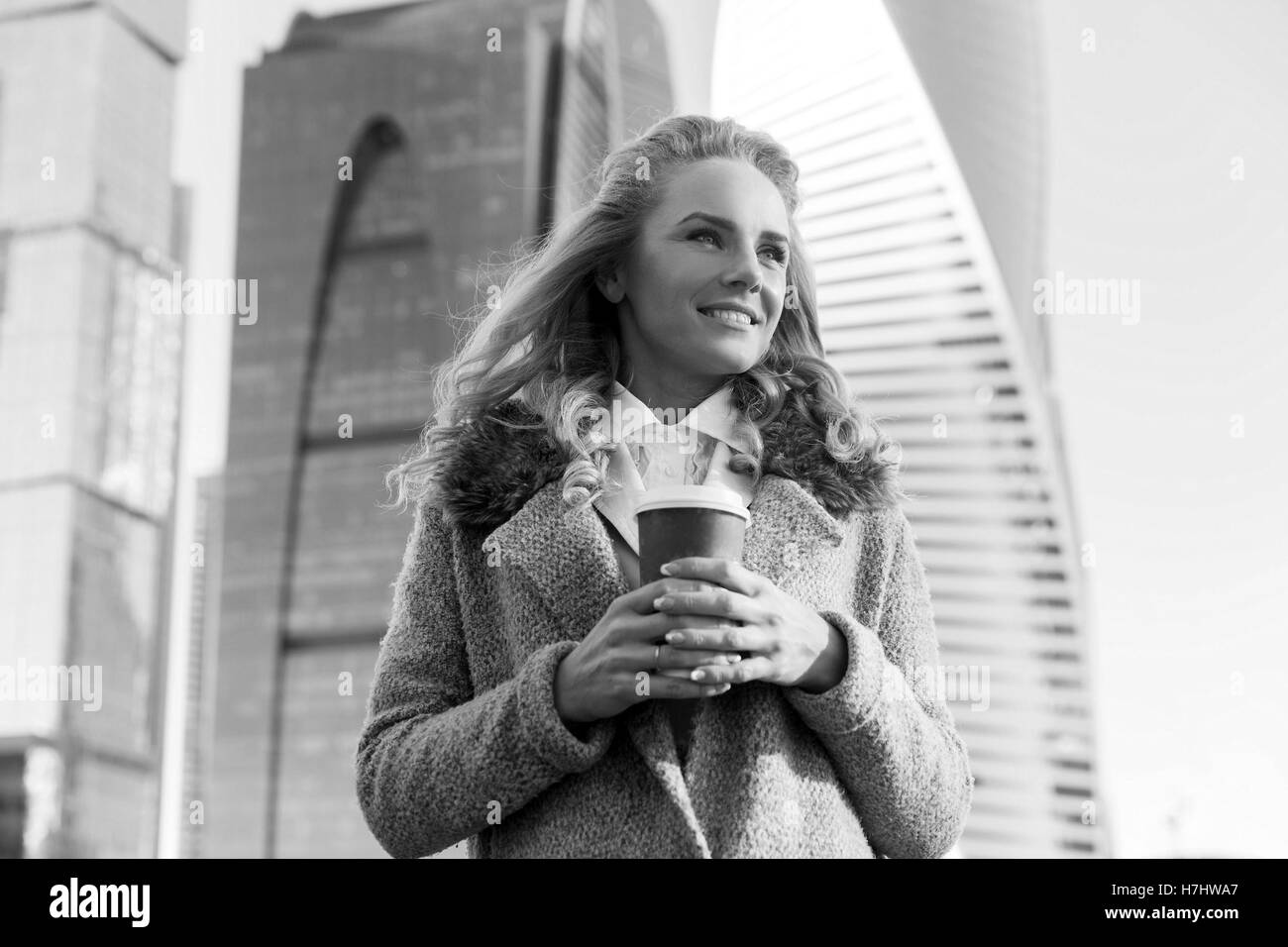Black and white portrait of beatiful smiling woman with coffee Stock Photo