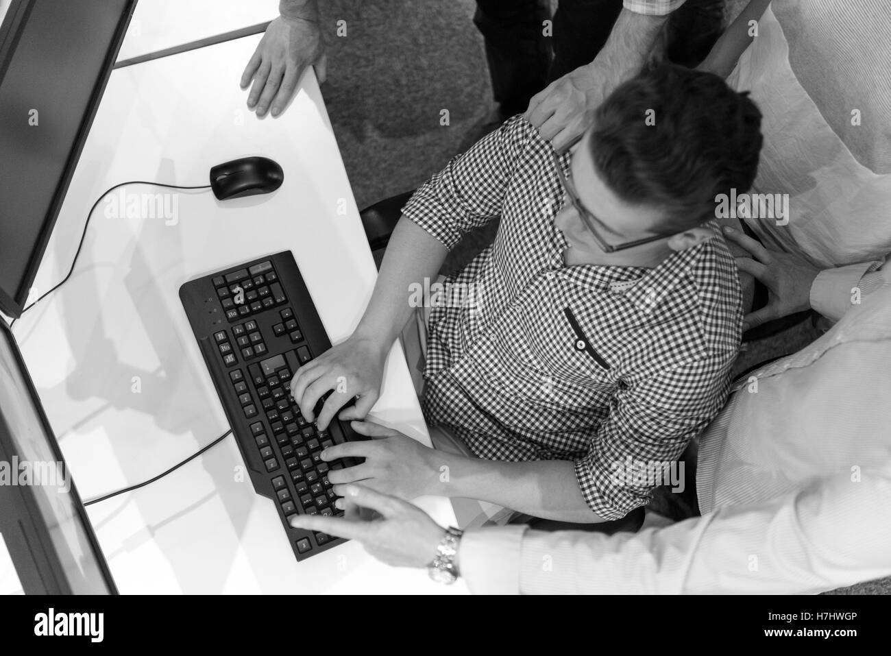 startup business people group working as team to find  solution Stock Photo