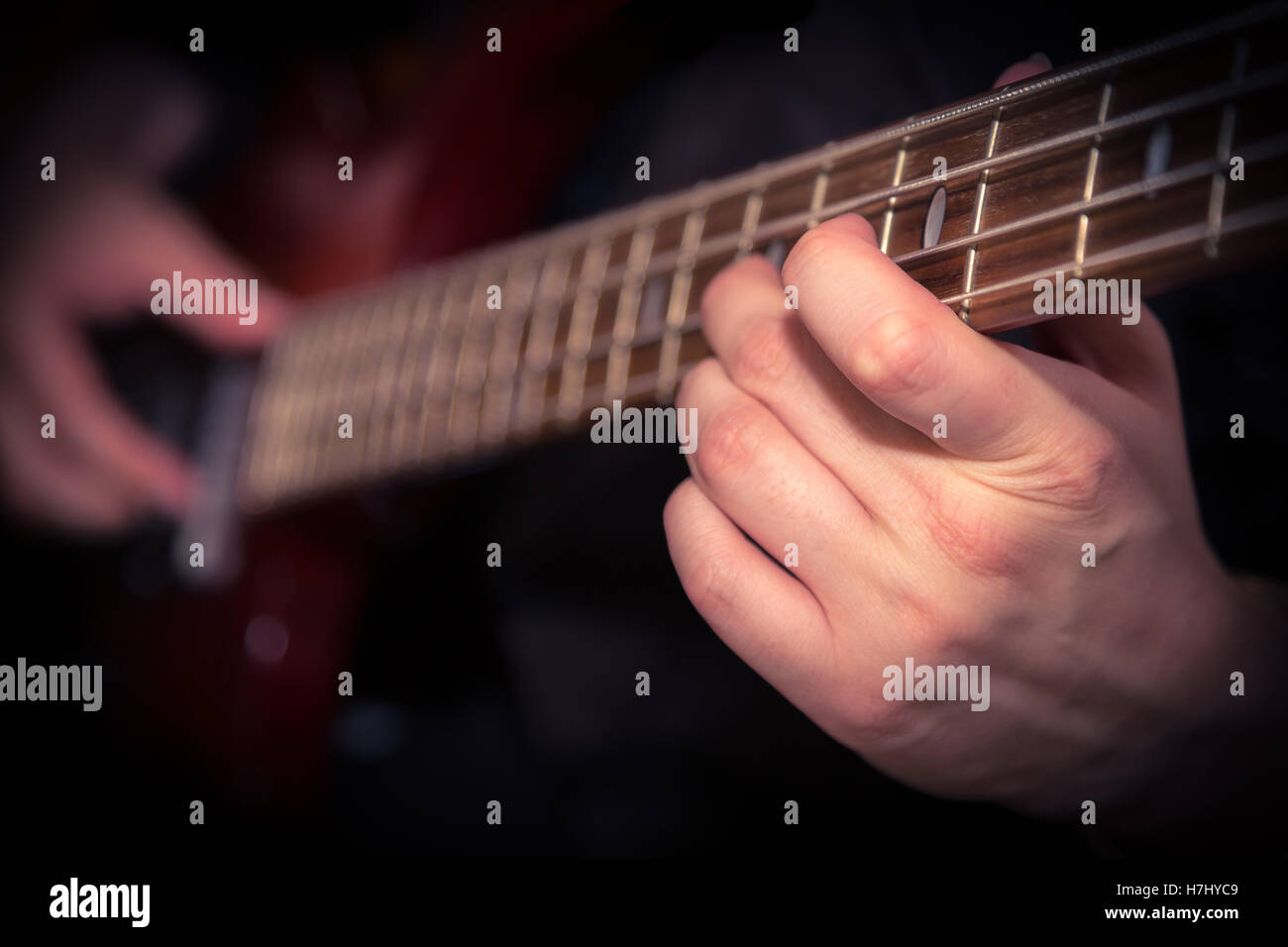 Male model playing electric guitar Stock Photo Alamy