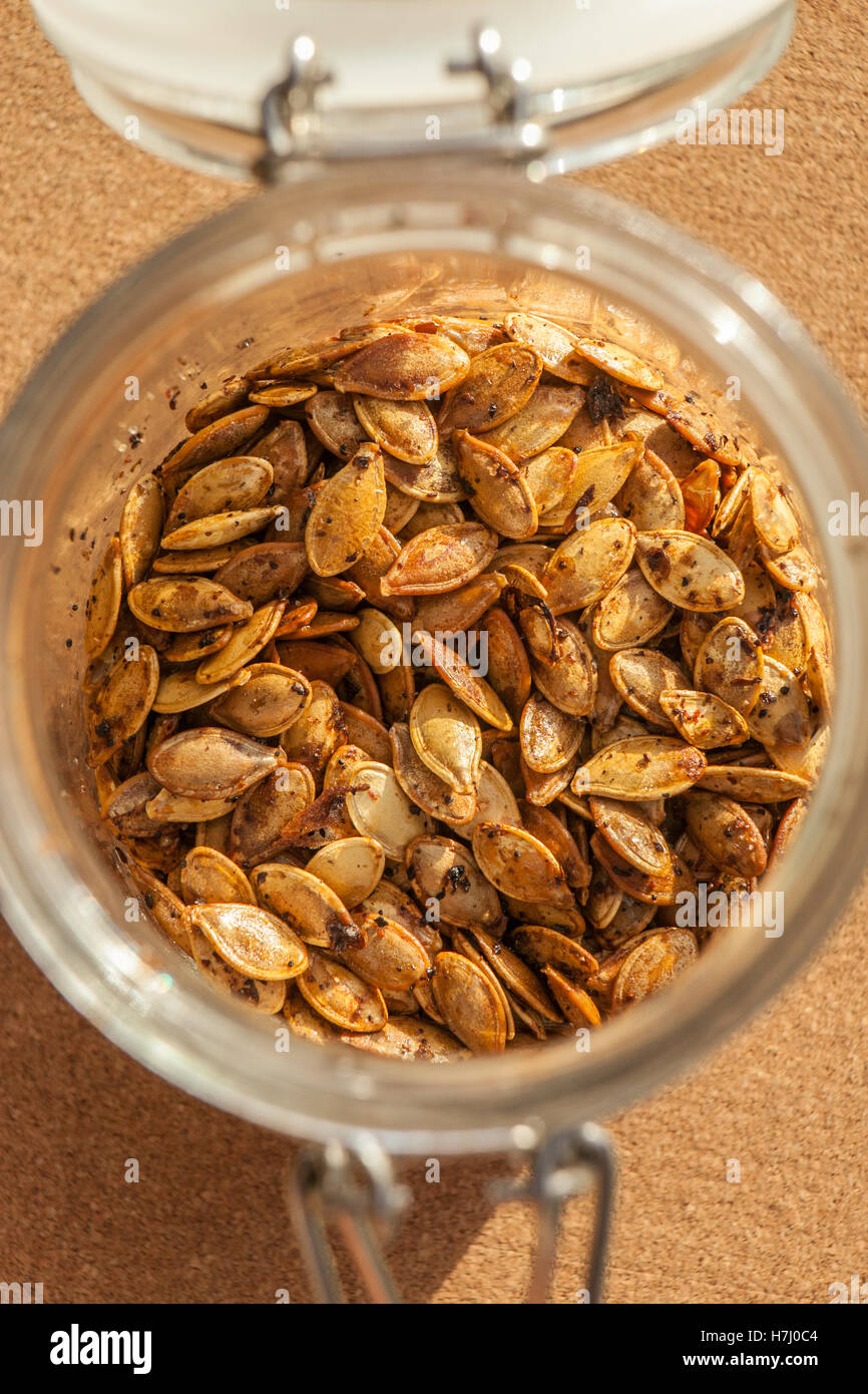 Roast  pumpkin seeds in a jar Stock Photo