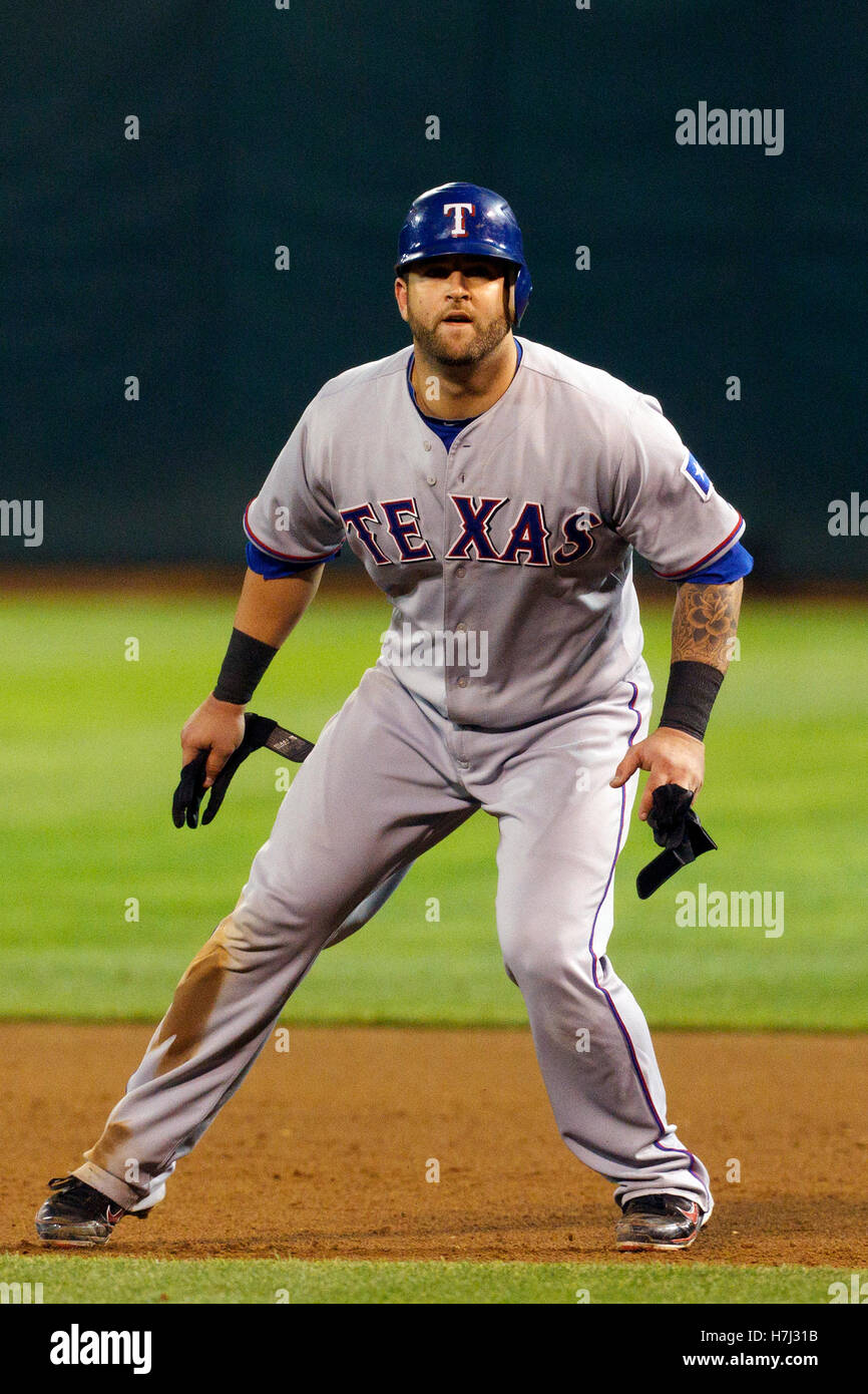 September 21, 2011; Oakland, CA, USA; Texas Rangers catcher Mike Napoli  (25) at bat against the Oakland Athletics during the second inning at O.co  Coliseum. Texas defeated Oakland 3-2 Stock Photo - Alamy