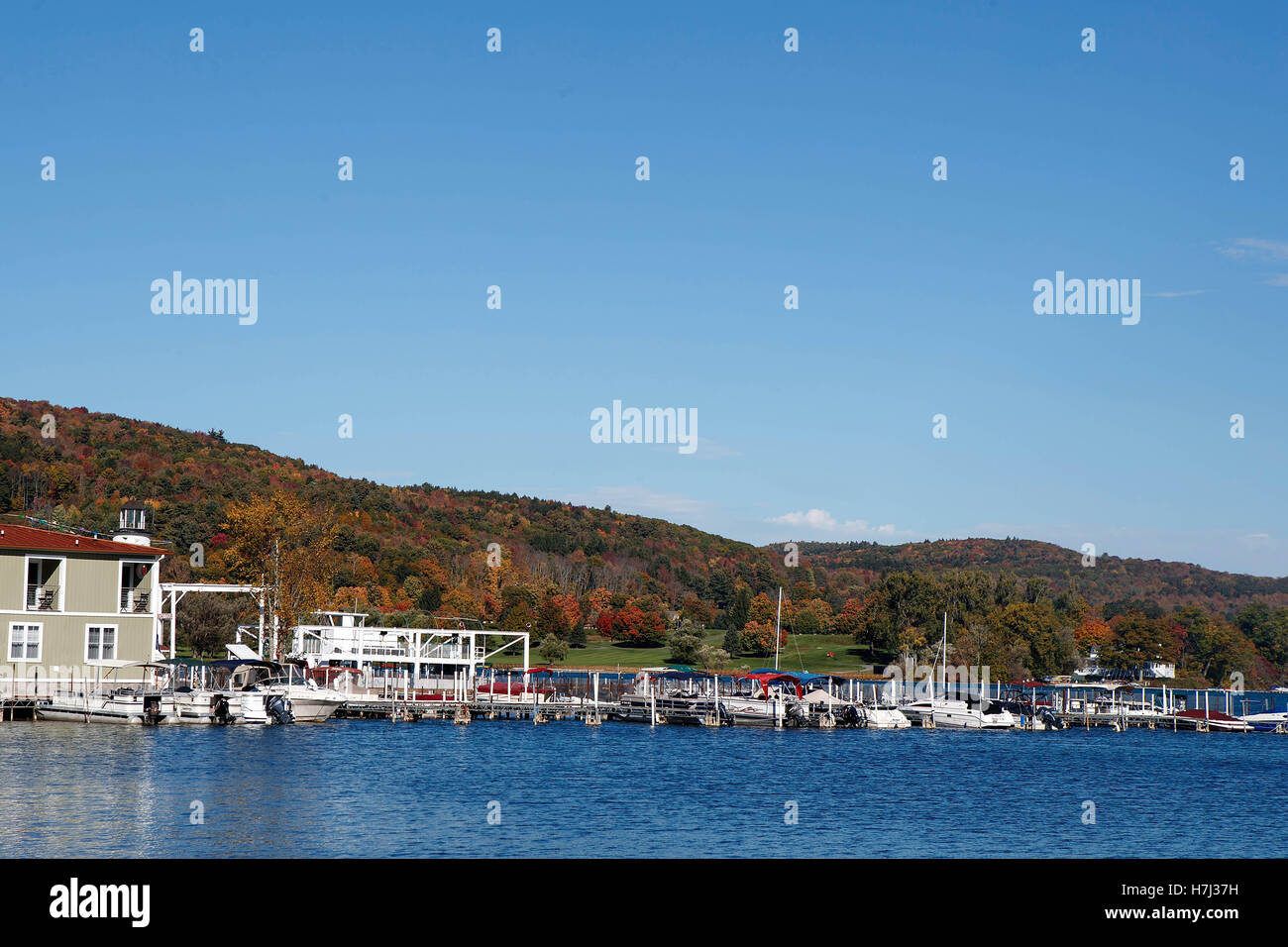 Cooperstown Lake Front Hotel and marina on Otesgo Lake, Cooperstown, New York, United States of America Stock Photo