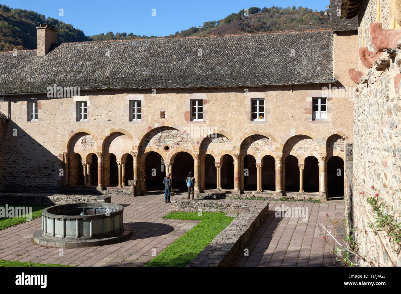 The cloister of the abbey-church of Saint Foy, at Conques (France), which receives a treasure: the reliquary statue of St Foy. Stock Photo