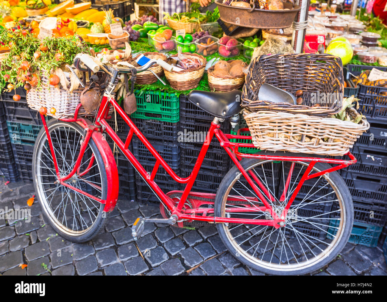 Charming market' still life with old bike with baskets. 'Campo di Fiori' in Rome Stock Photo