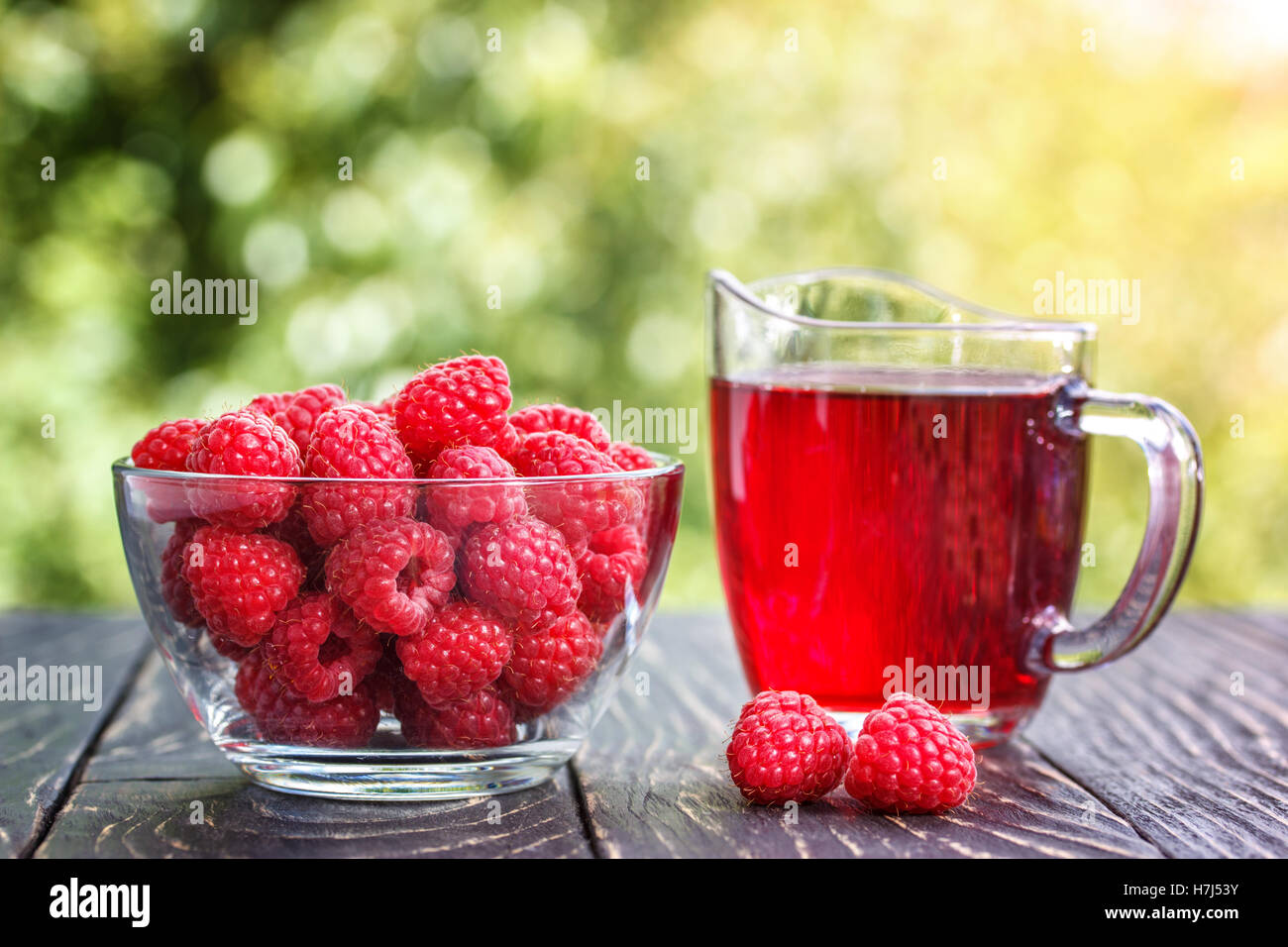 fresh raspberries and raspberry juice Stock Photo - Alamy