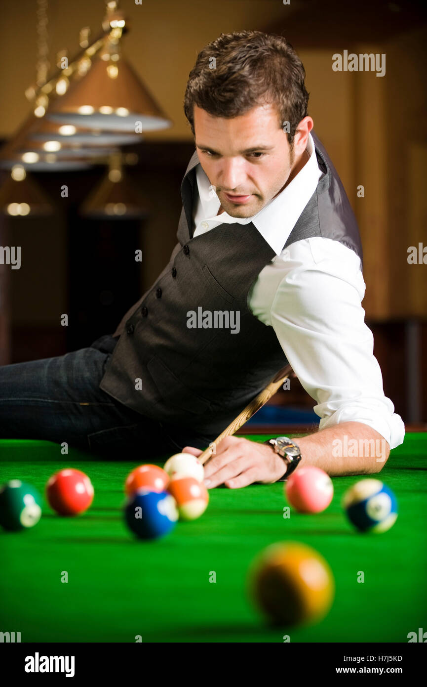 Man playing billiard Stock Photo Alamy