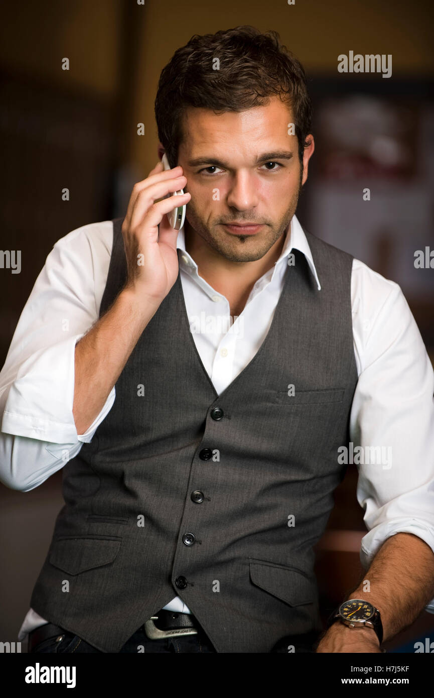 Attractive man, 30+, with mobile phone Stock Photo