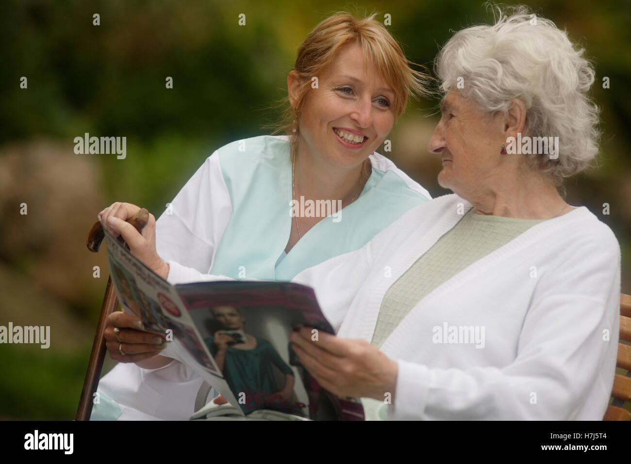 Old woman with nurse Stock Photo