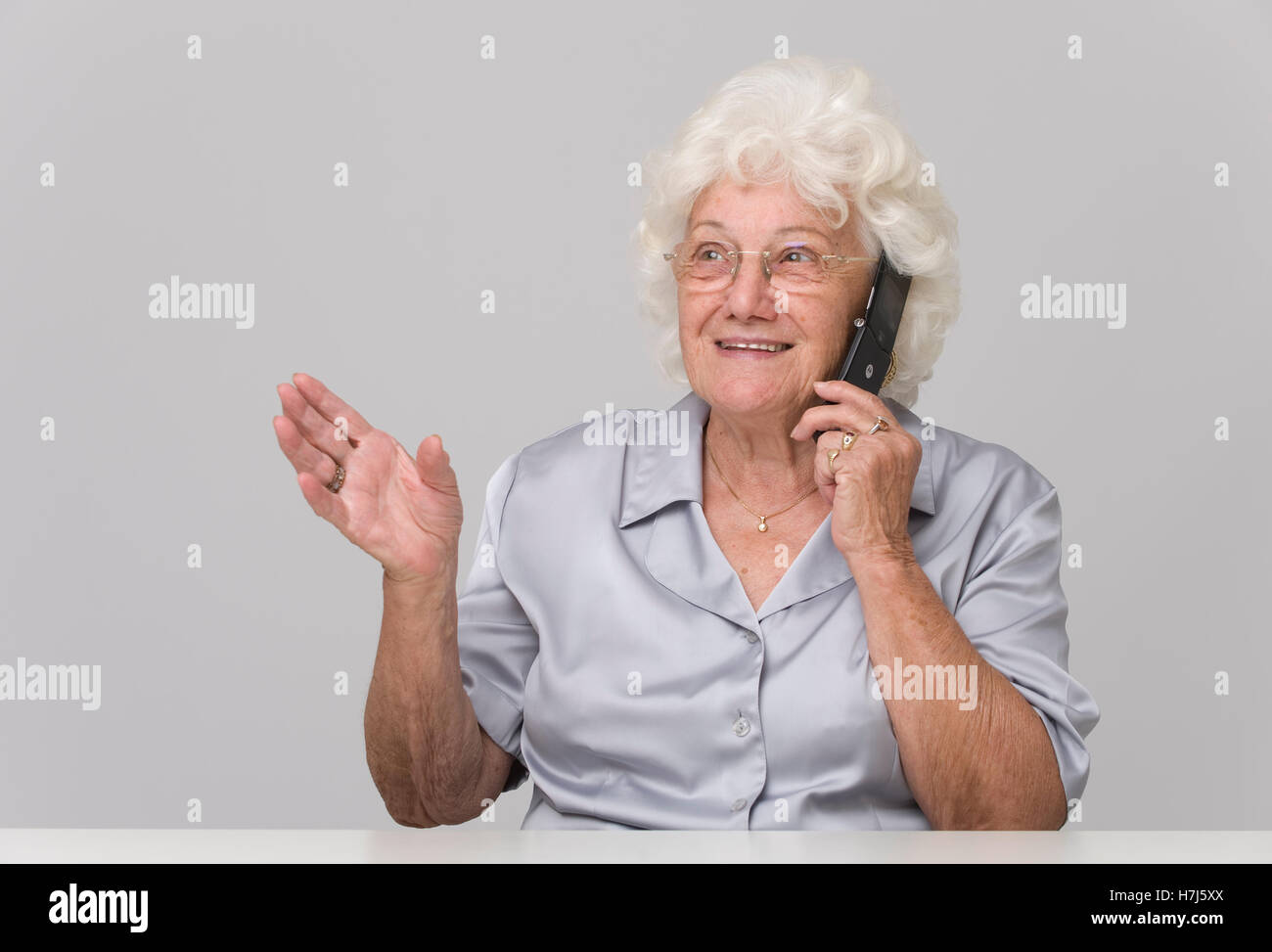 Senior woman with mobile phone Stock Photo