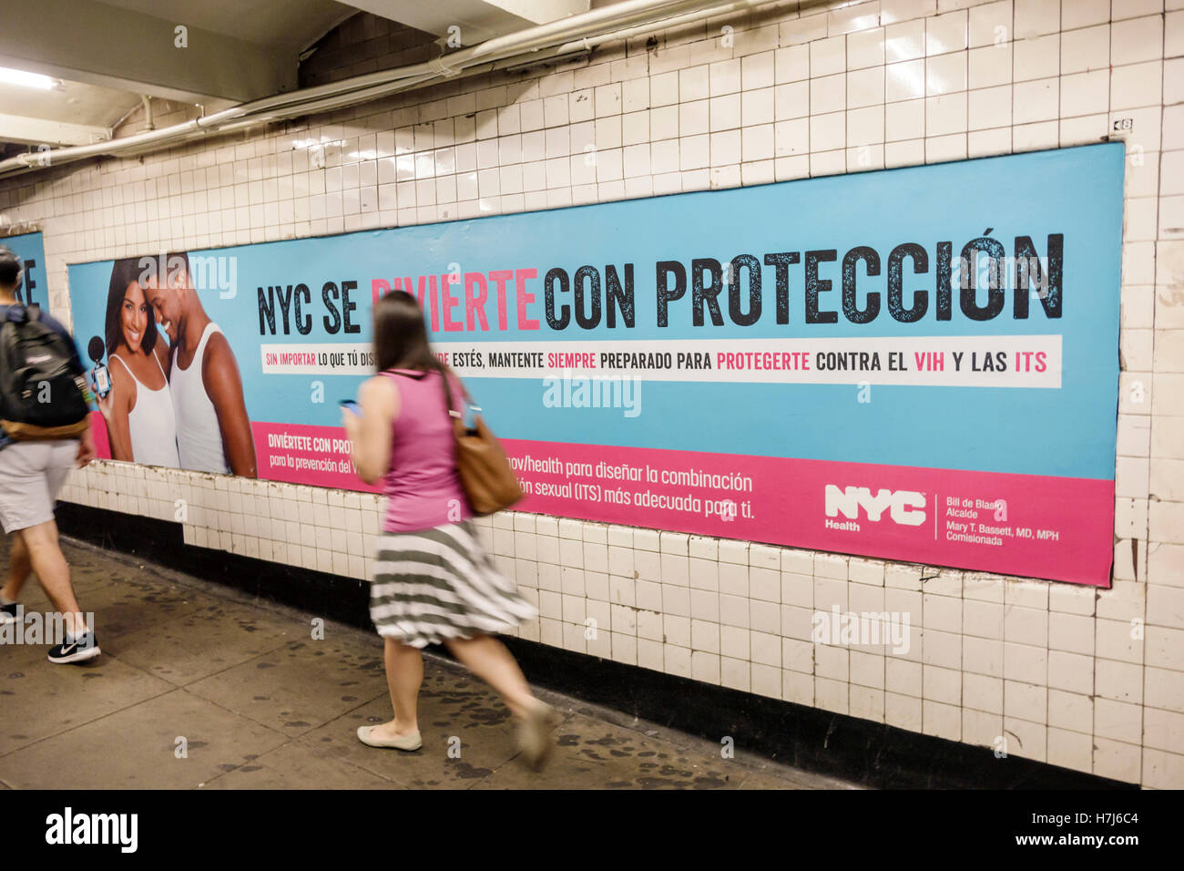New York City,NY NYC Lower Manhattan,West Village,subway,MTA,Christopher Street-Sheridan Square,station,adult adults,woman female women,motion,walking Stock Photo