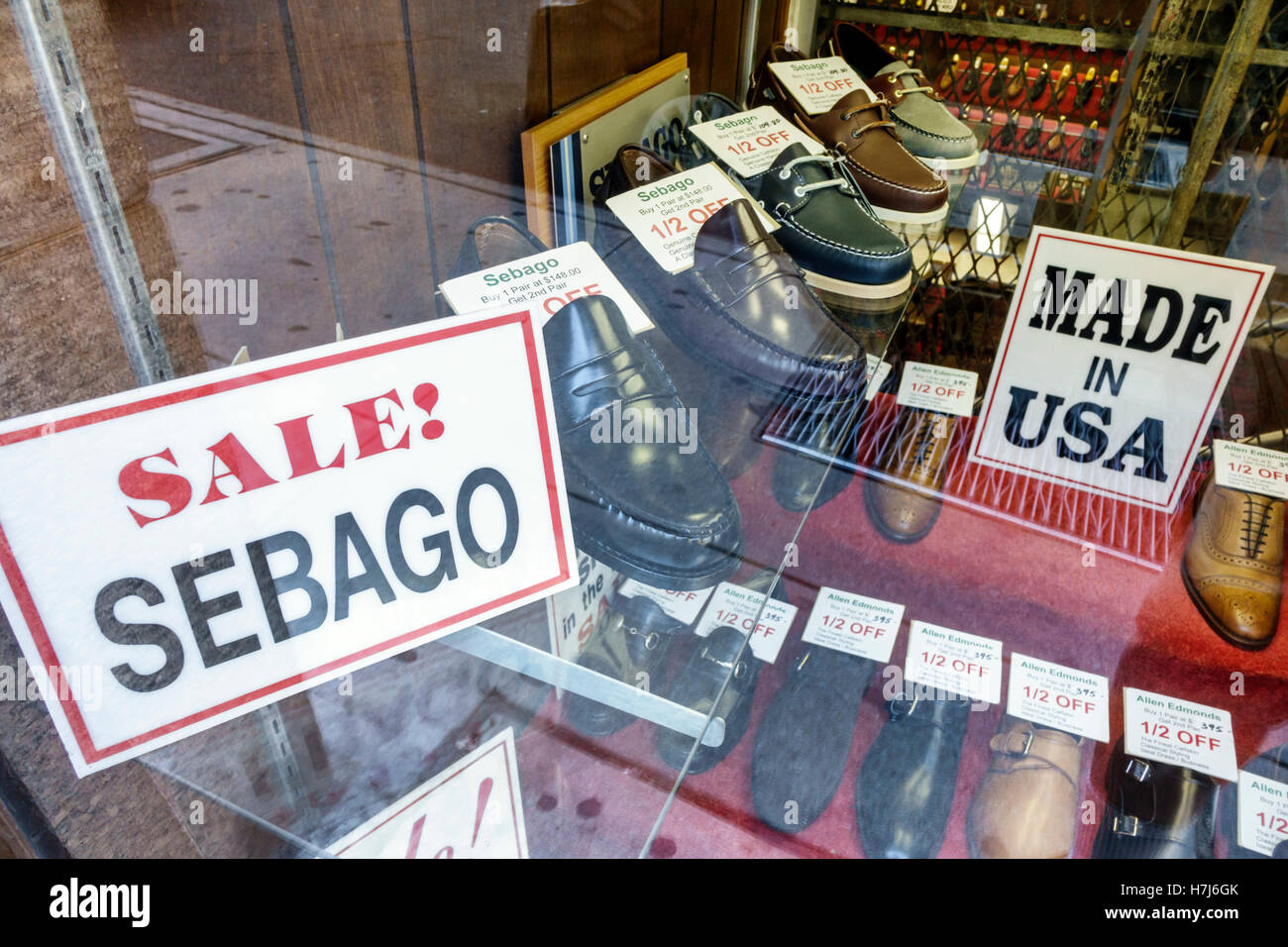 New York City,NY NYC,Lower Manhattan,shoe store,window,men's shoes,Sebago,brand,sign,sale,half  price,made in USA,penny loafers,visitors travel traveli Stock Photo - Alamy