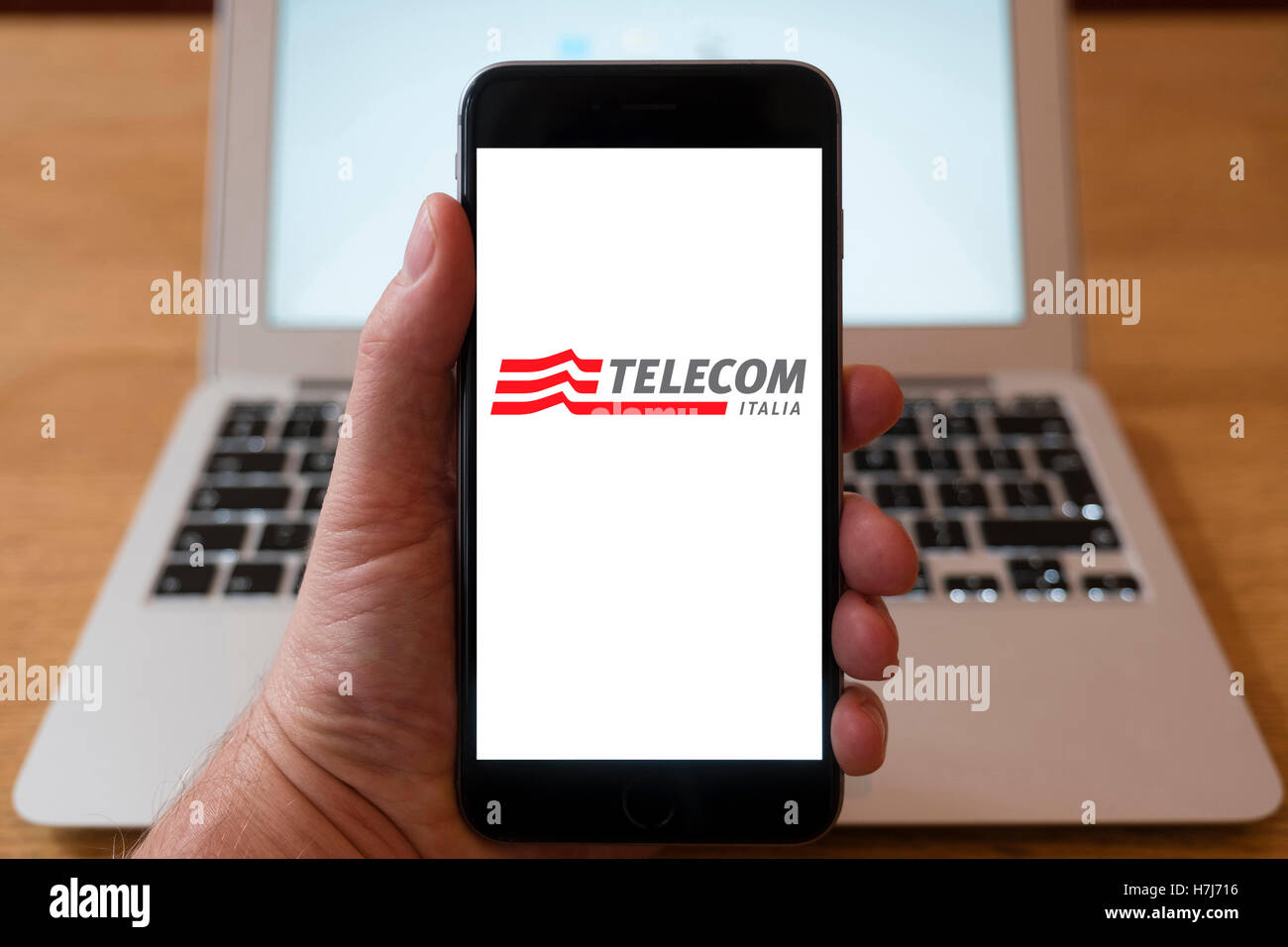 Using iPhone smartphone to display logo of Telecom Italia Stock Photo -  Alamy