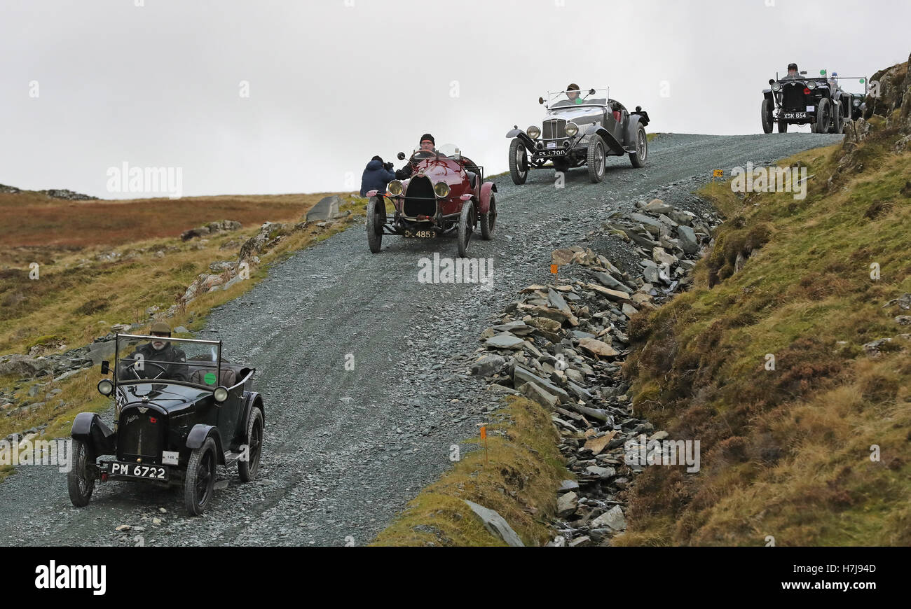 Vintage cars race along the Honister pass in Cumbria, during the annual