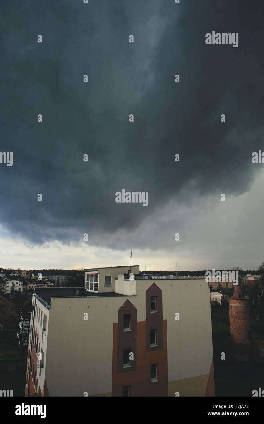 Dramatic dark storm clouds over the city Stock Photo - Alamy