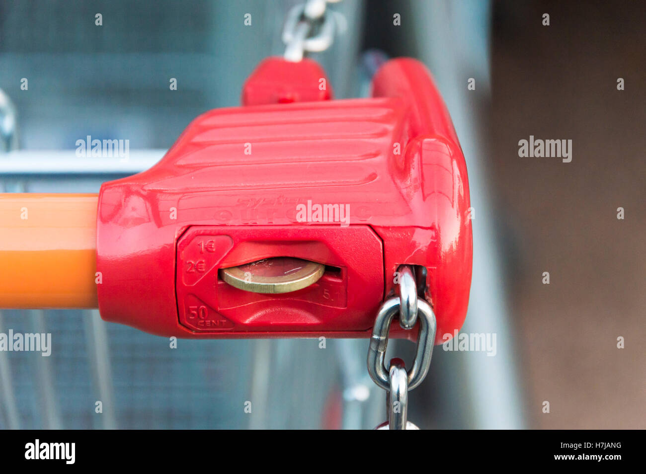 Forli, Italy - 30th October 2016: Detail of a shopping cart locking system, with 1 euro coin inside Stock Photo