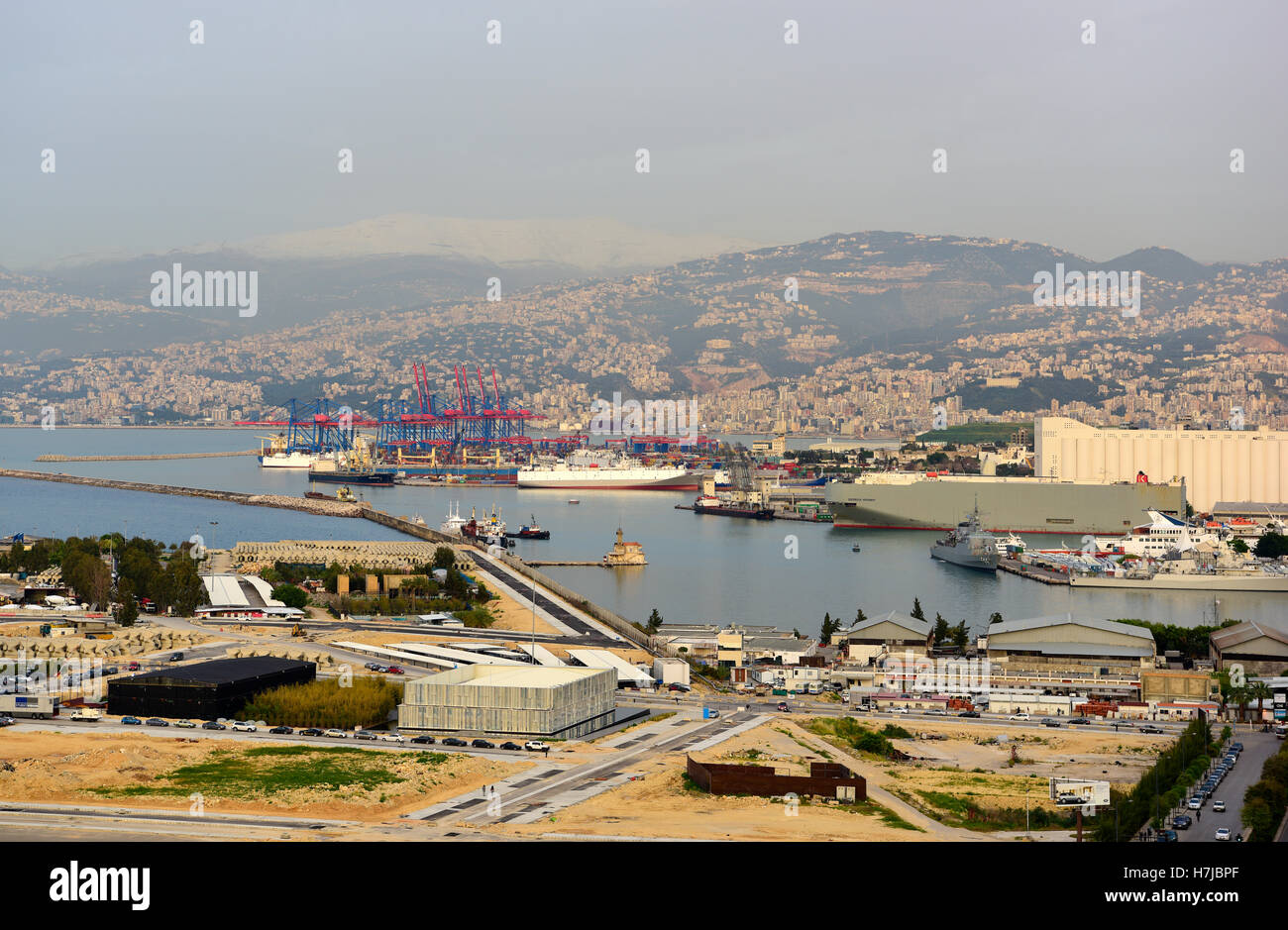 View over the waterfront and port with Mount Lebanon beyond, Beirut, Lebanon. Stock Photo