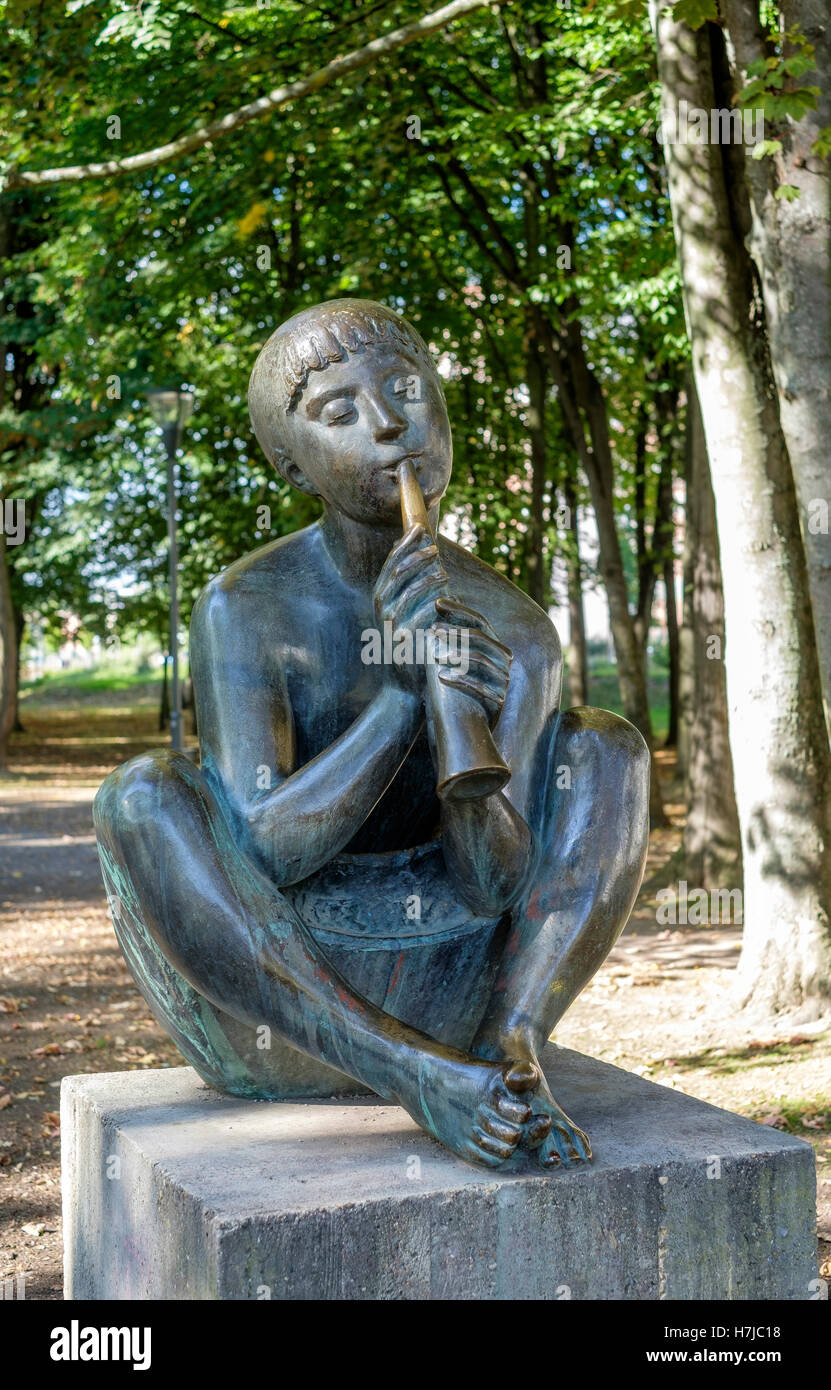 Reedpipe player, bronze sculpture by French sculptor Jean Henninger
