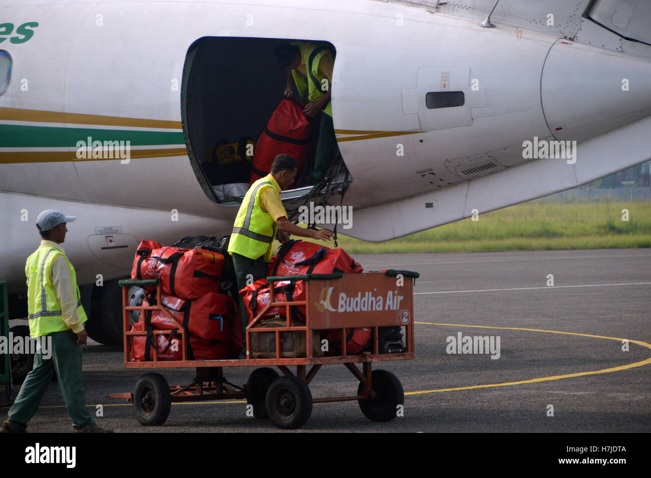 Baggage Handlers on a Jetstream 41Turboproppowered Plane from Yeti
