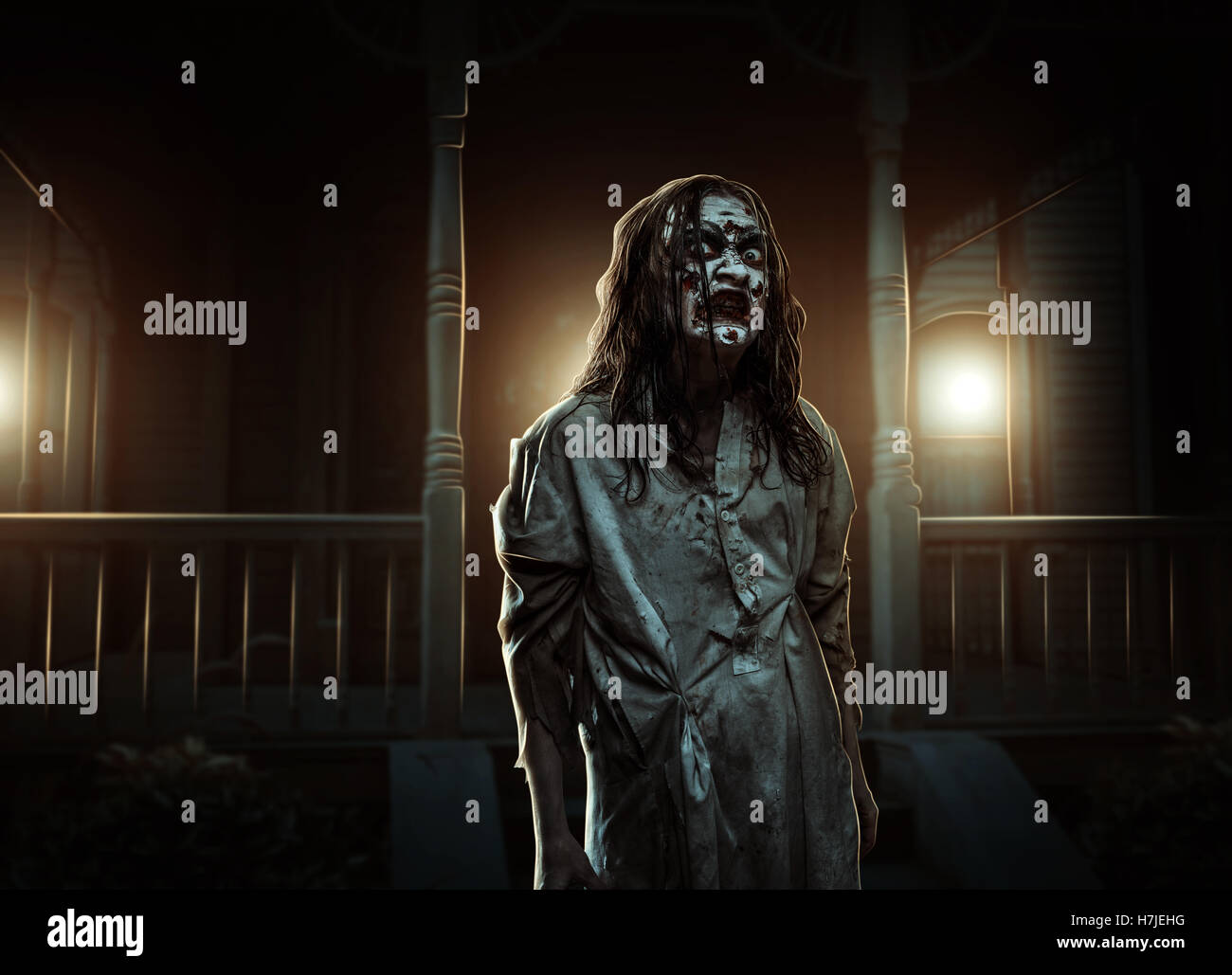 Horror zombie near the abandoned house. Halloween Stock Photo Alamy