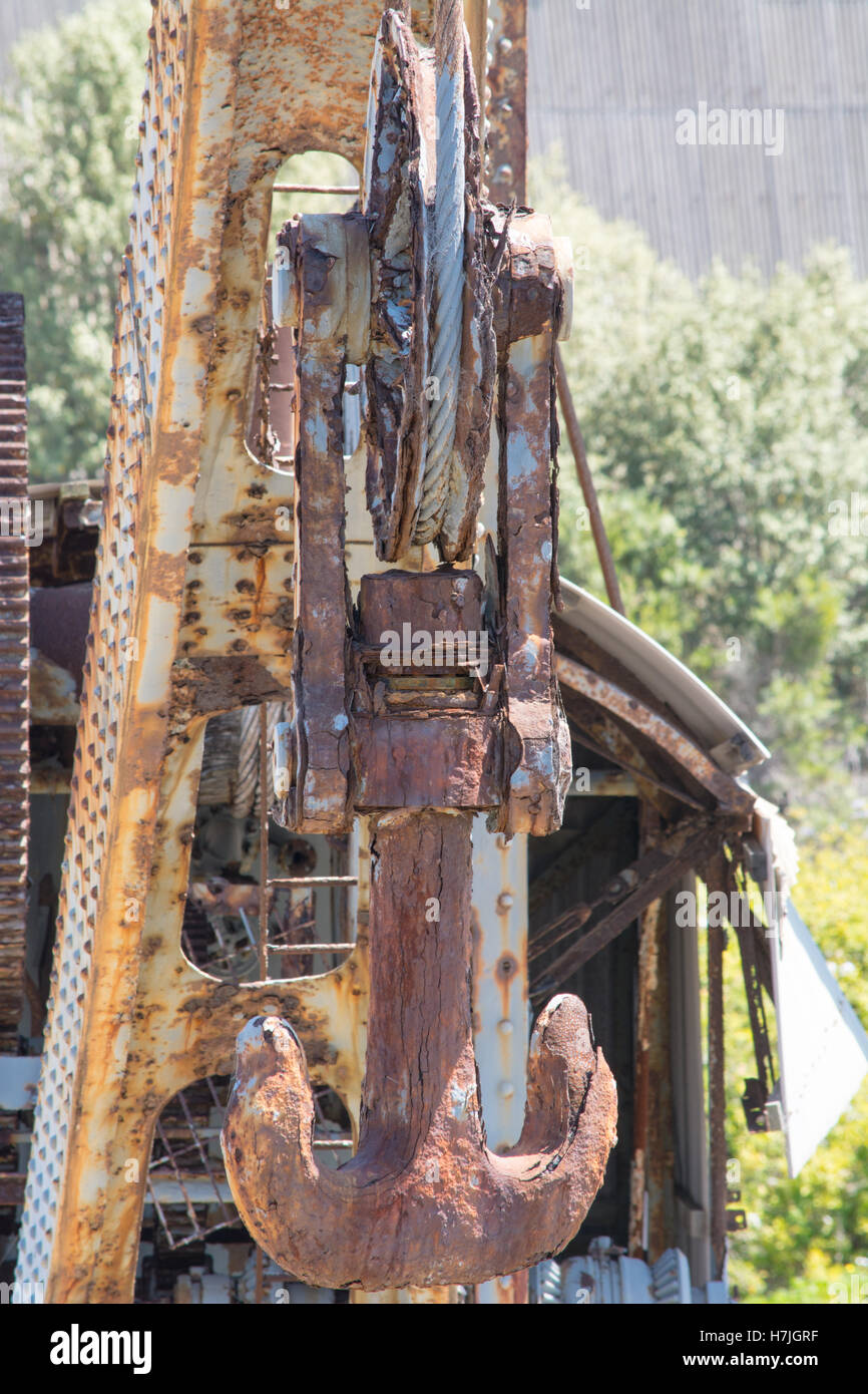 Crane used to construct Pork Kembla breakwall lays dormant rusting away. Stock Photo