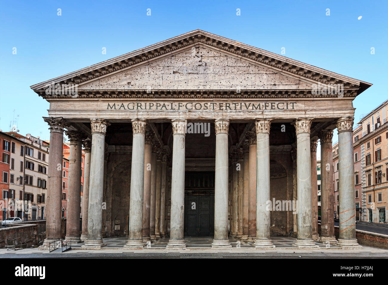 Facade colonnade and entrance to ancient roman temple Pantheon. City square in a heart of Italian roman capital with nobody Stock Photo