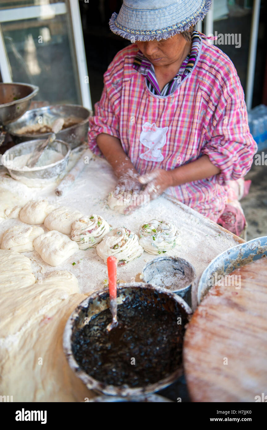 Xizhou baba, otherwise known as poshu, a bread snack native to Dali stuffed with pork, chives